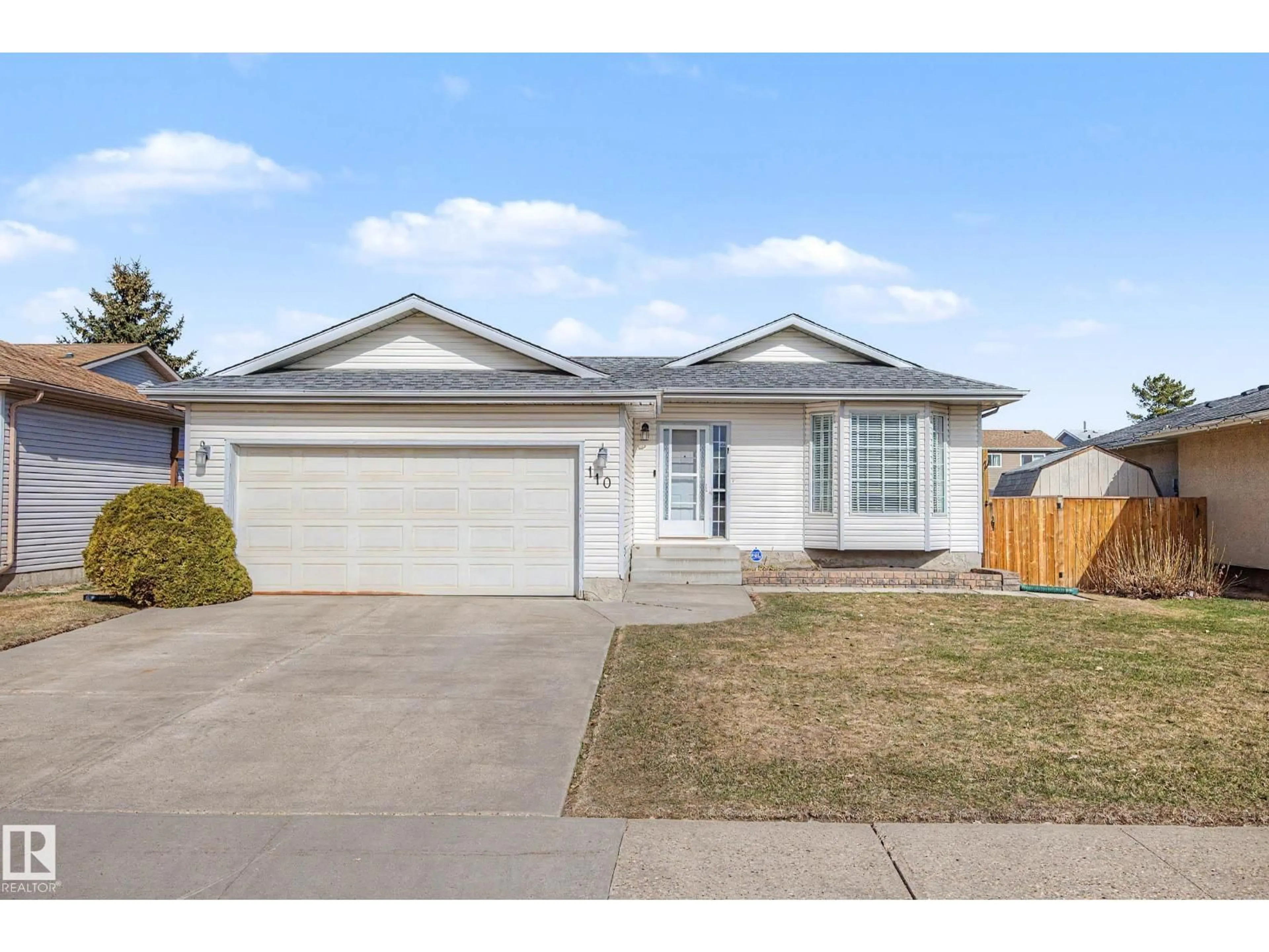 Home with vinyl exterior material, street for 110 LUNNON DR, Gibbons Alberta T0A1N0