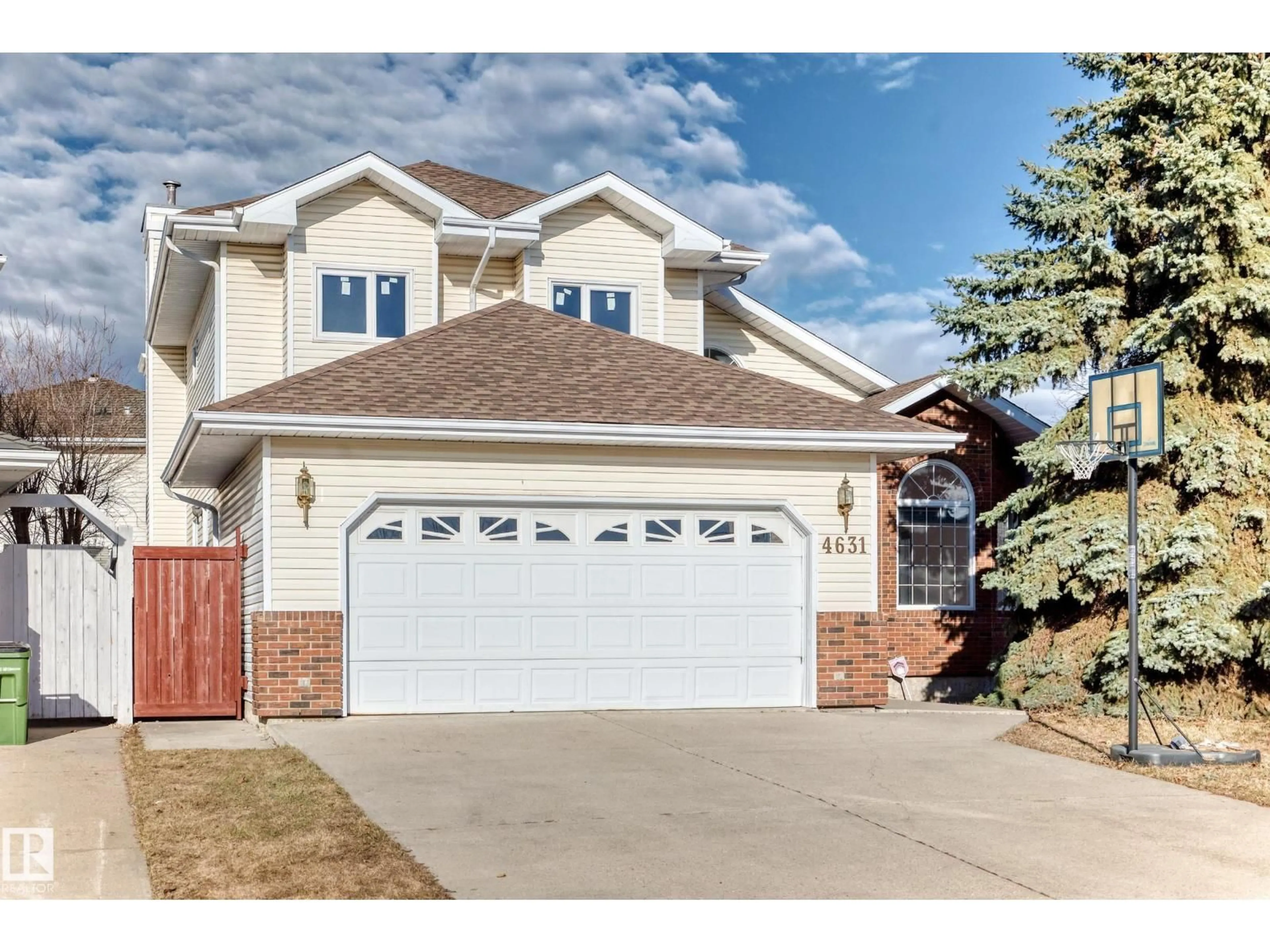 Home with vinyl exterior material, street for 4631 43 AV, Edmonton Alberta T6L6L9