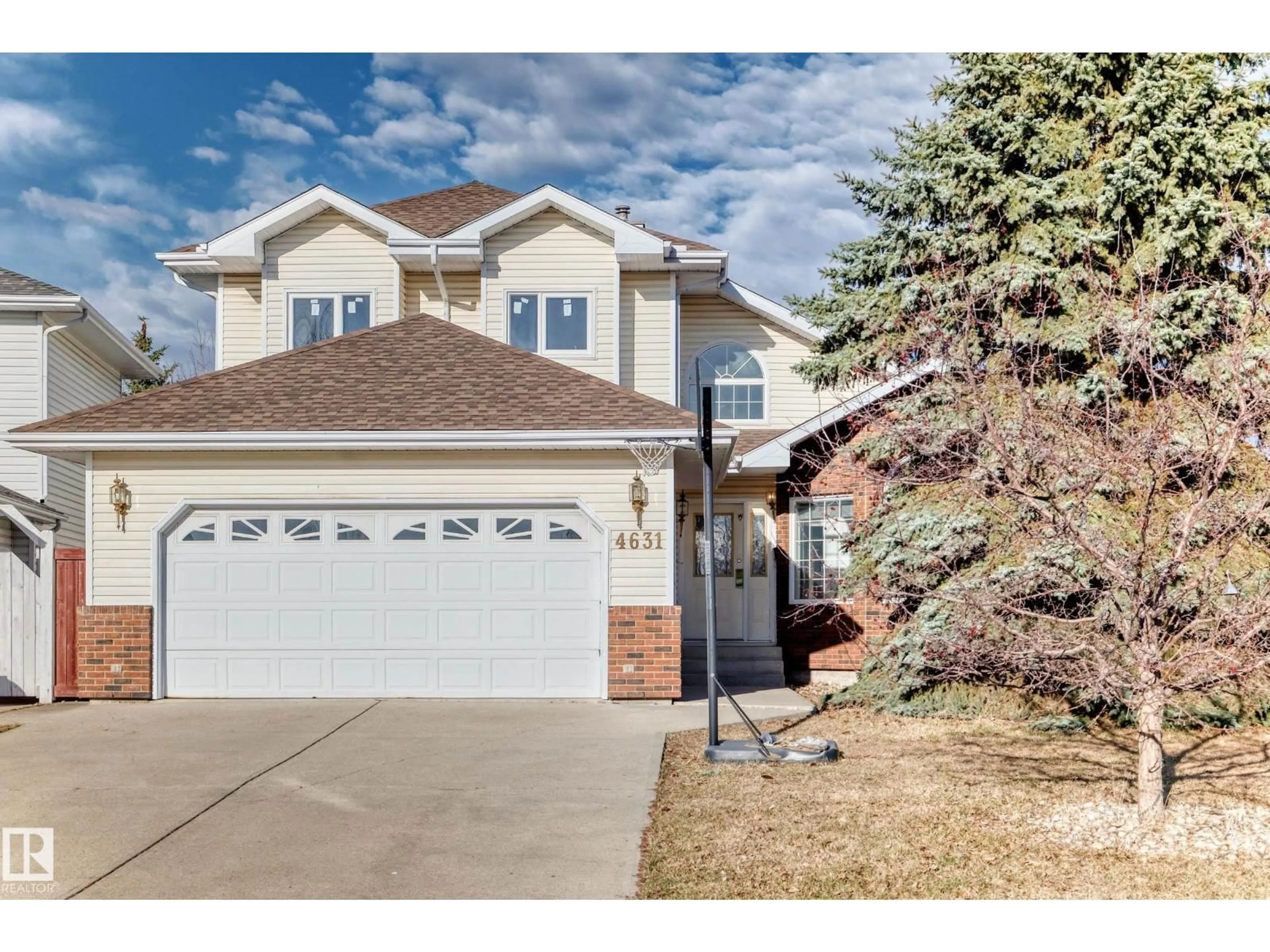 Home with vinyl exterior material, street for 4631 43 AV, Edmonton Alberta T6L6L9