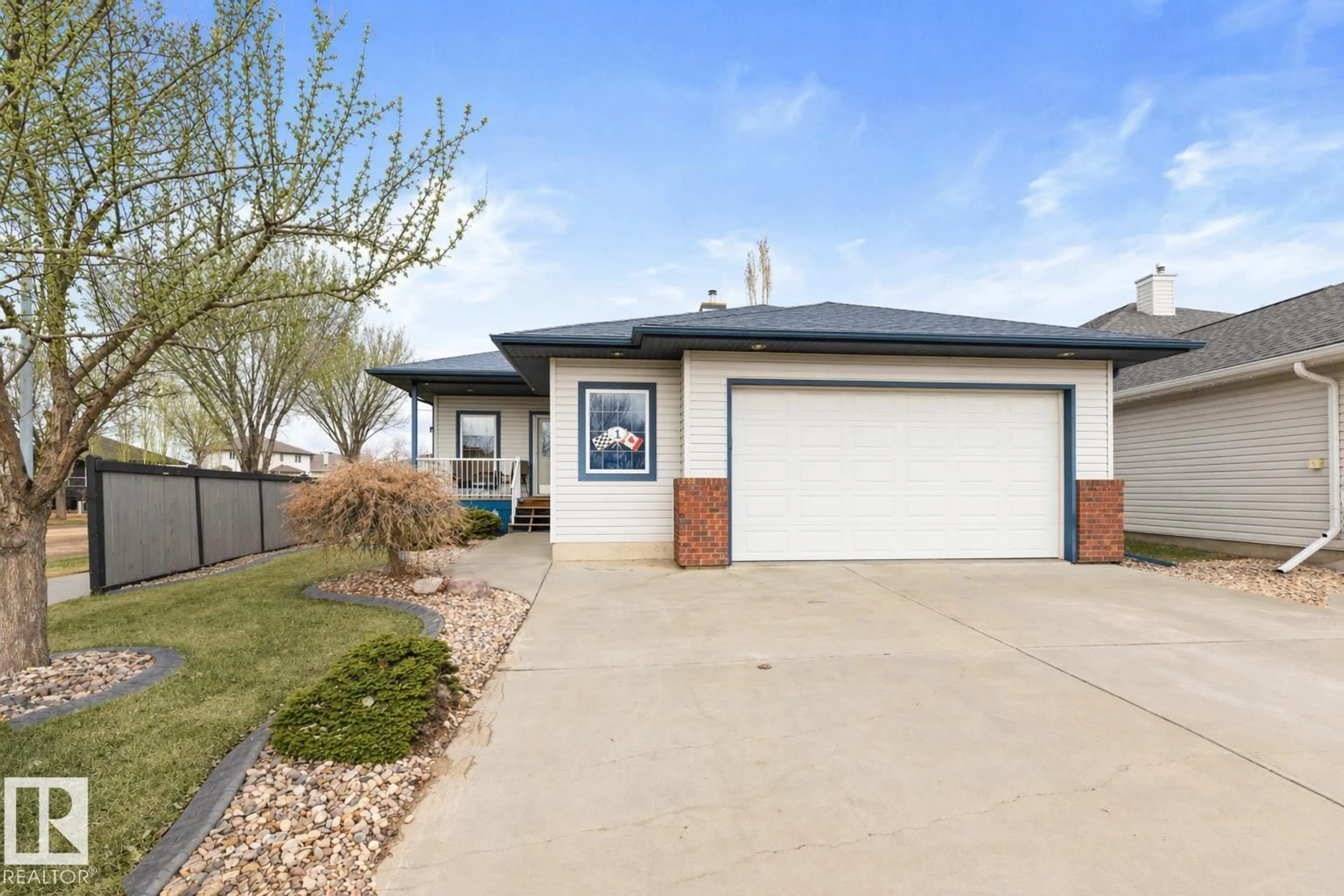 Home with vinyl exterior material, street for 1 BIRCHWOOD CL, Leduc Alberta T9E8B5