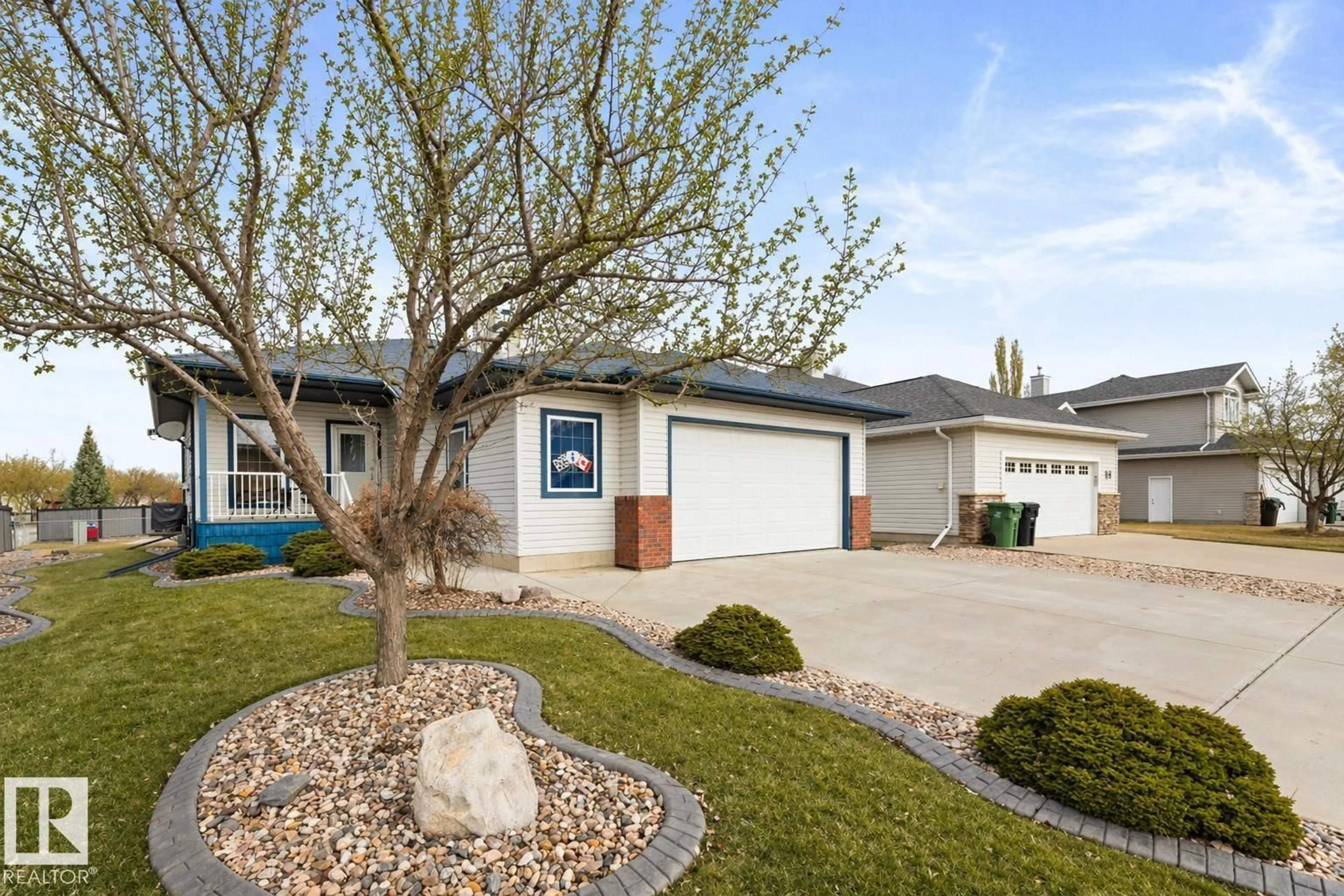 Home with vinyl exterior material, street for 1 BIRCHWOOD CL, Leduc Alberta T9E8B5