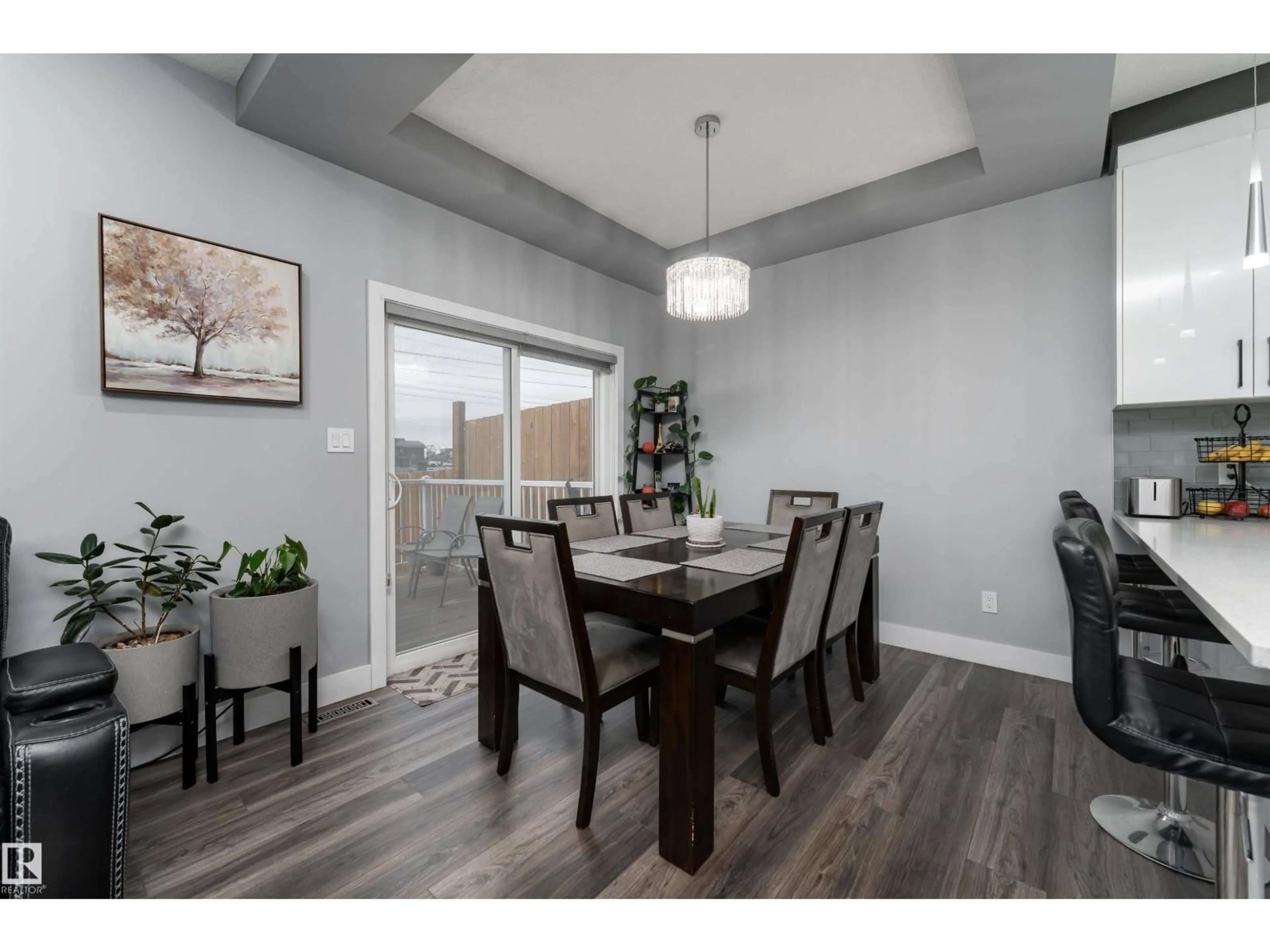 Dining room, wood/laminate floor for 1613 ENRIGHT WY, Edmonton Alberta T6M0Z3