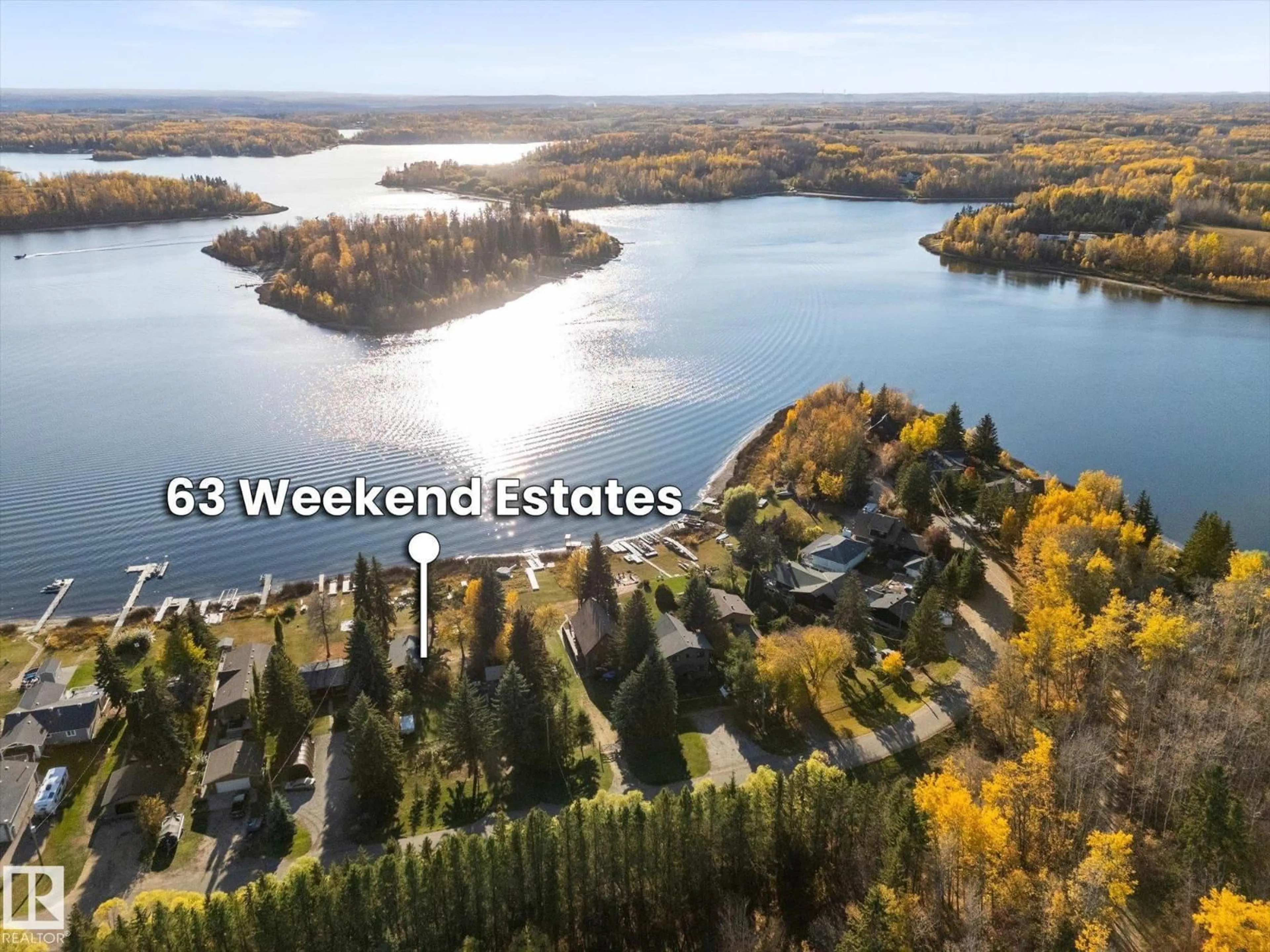 A pic from outside/outdoor area/front of a property/back of a property/a pic from drone, water/lake/river/ocean view for 63 2304 TWP ROAD 522, Rural Parkland County Alberta T7Y2J7