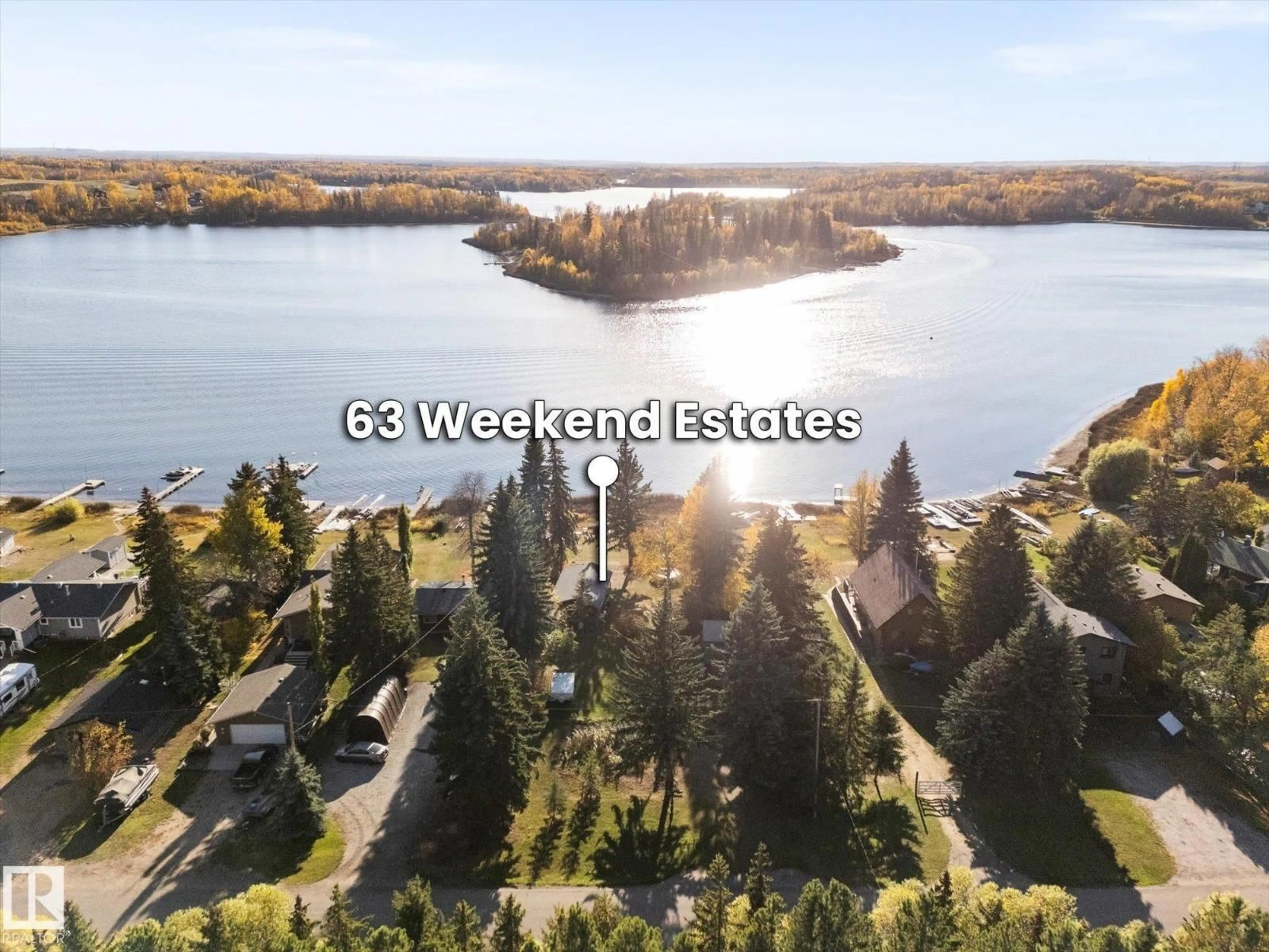A pic from outside/outdoor area/front of a property/back of a property/a pic from drone, water/lake/river/ocean view for 63 2304 TWP ROAD 522, Rural Parkland County Alberta T7Y2J7