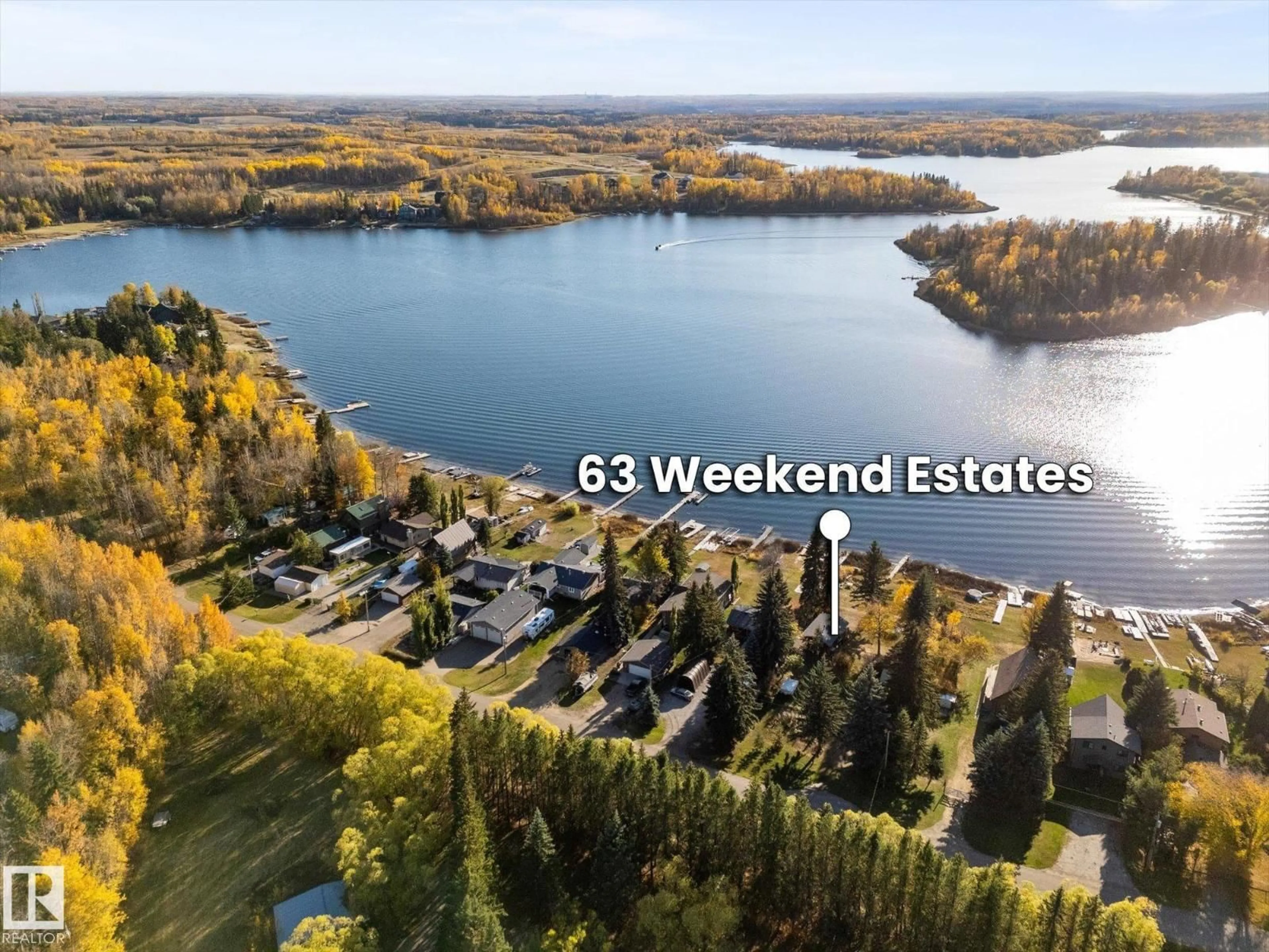 A pic from outside/outdoor area/front of a property/back of a property/a pic from drone, water/lake/river/ocean view for 63 2304 TWP ROAD 522, Rural Parkland County Alberta T7Y2J7