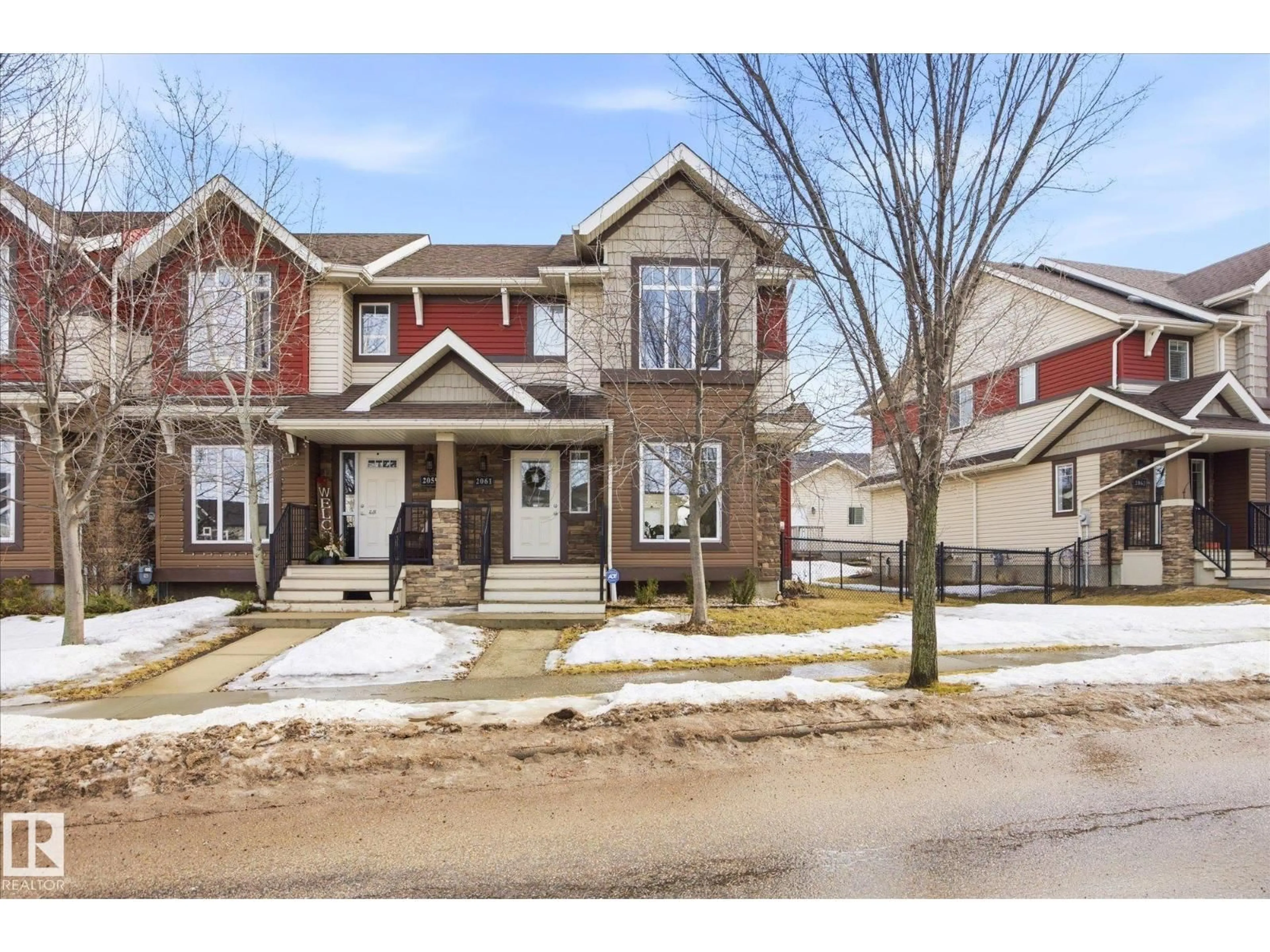 Home with brick exterior material, street for 2061 TRUMPETER WY, Edmonton Alberta T5S0E7