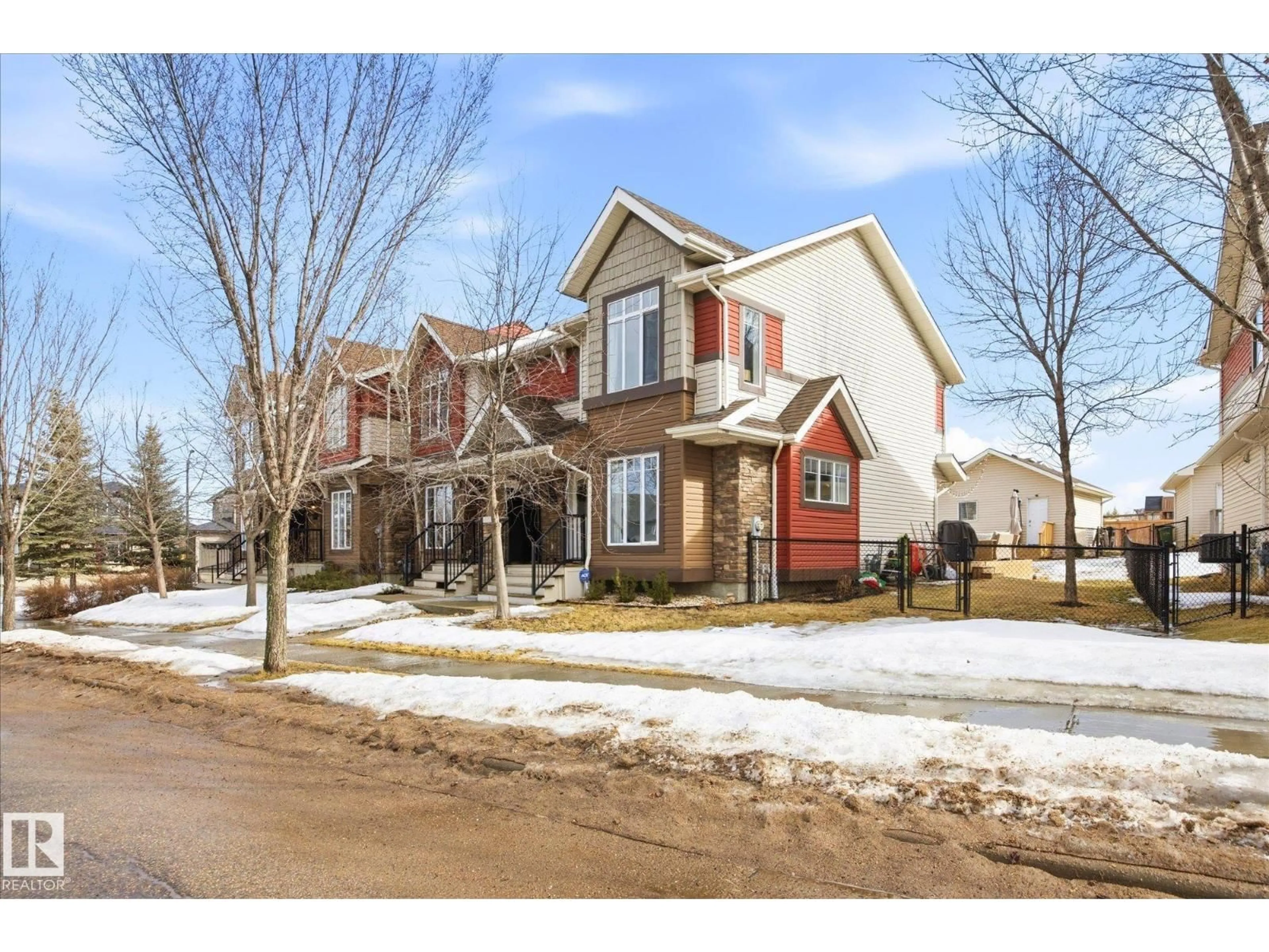 Home with brick exterior material, street for 2061 TRUMPETER WY, Edmonton Alberta T5S0E7