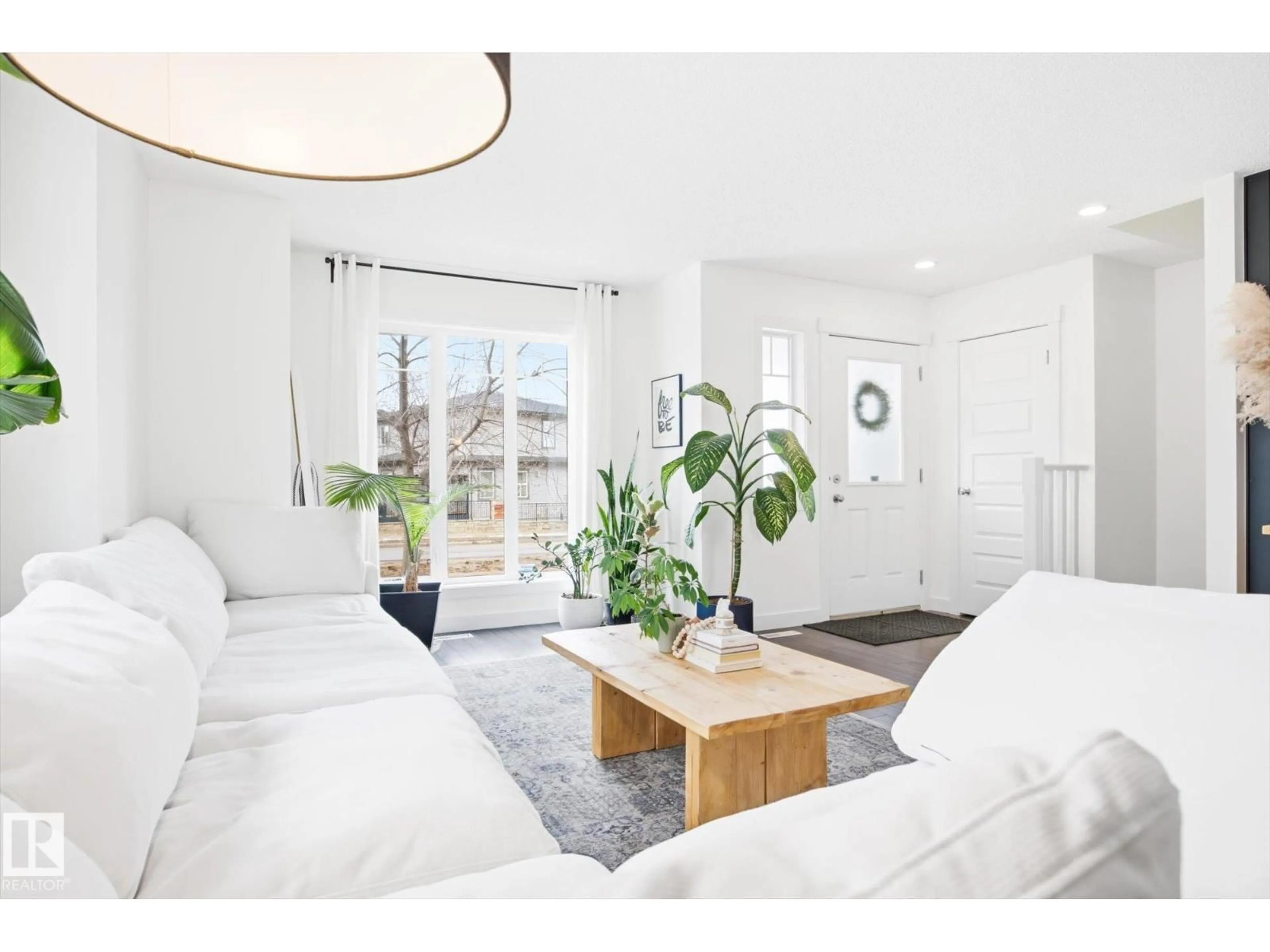 Living room with furniture, unknown for 2061 TRUMPETER WY, Edmonton Alberta T5S0E7