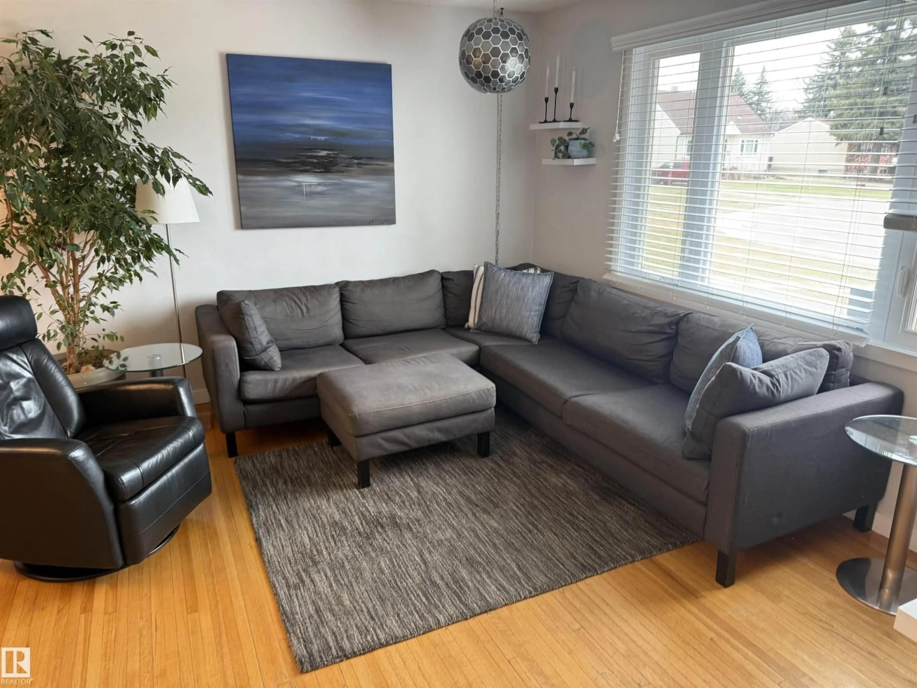 Living room with furniture, wood/laminate floor for NW - 11948 132 ST, Edmonton Alberta T5L1P4