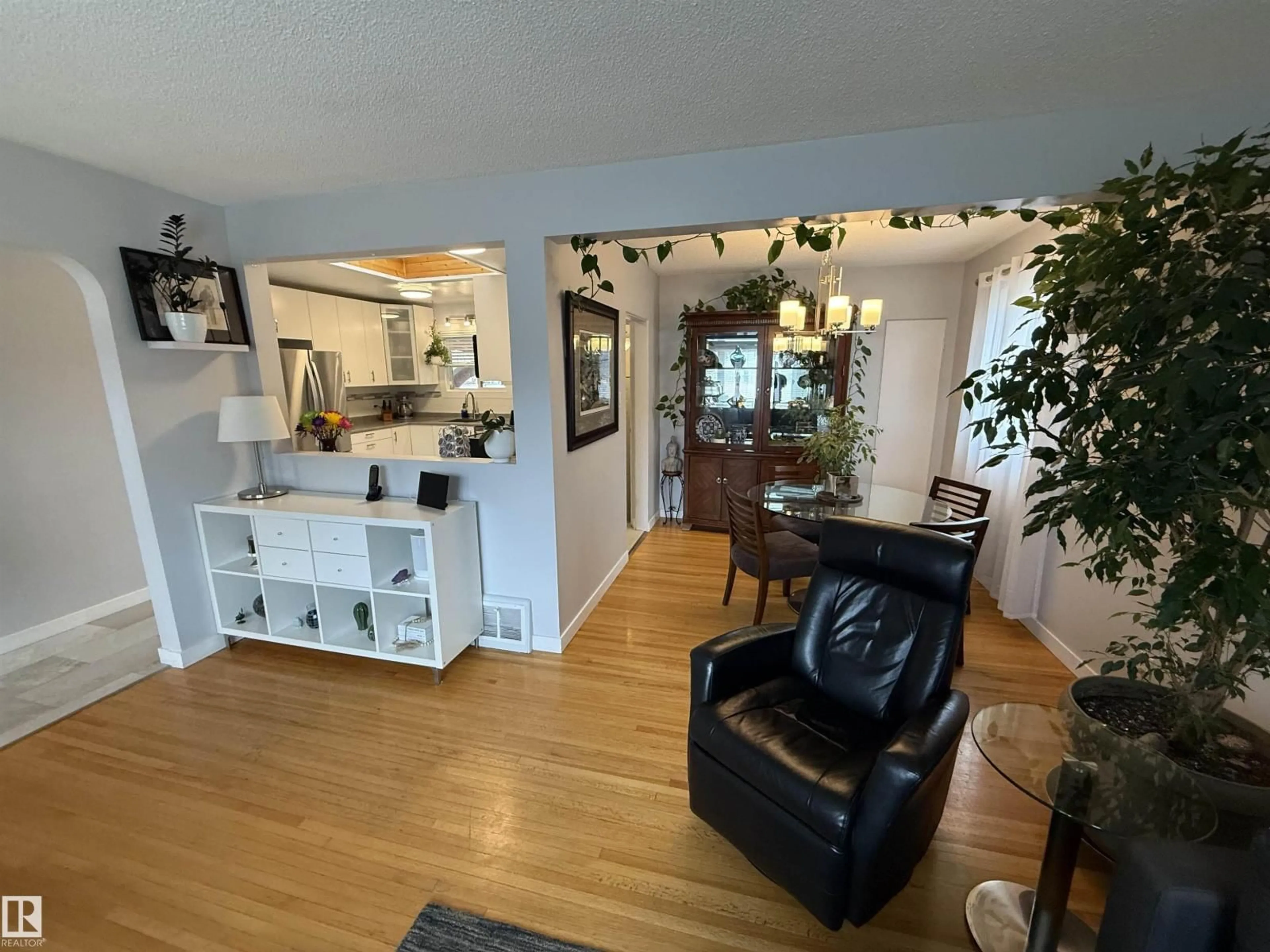 Living room with furniture, wood/laminate floor for NW - 11948 132 ST, Edmonton Alberta T5L1P4
