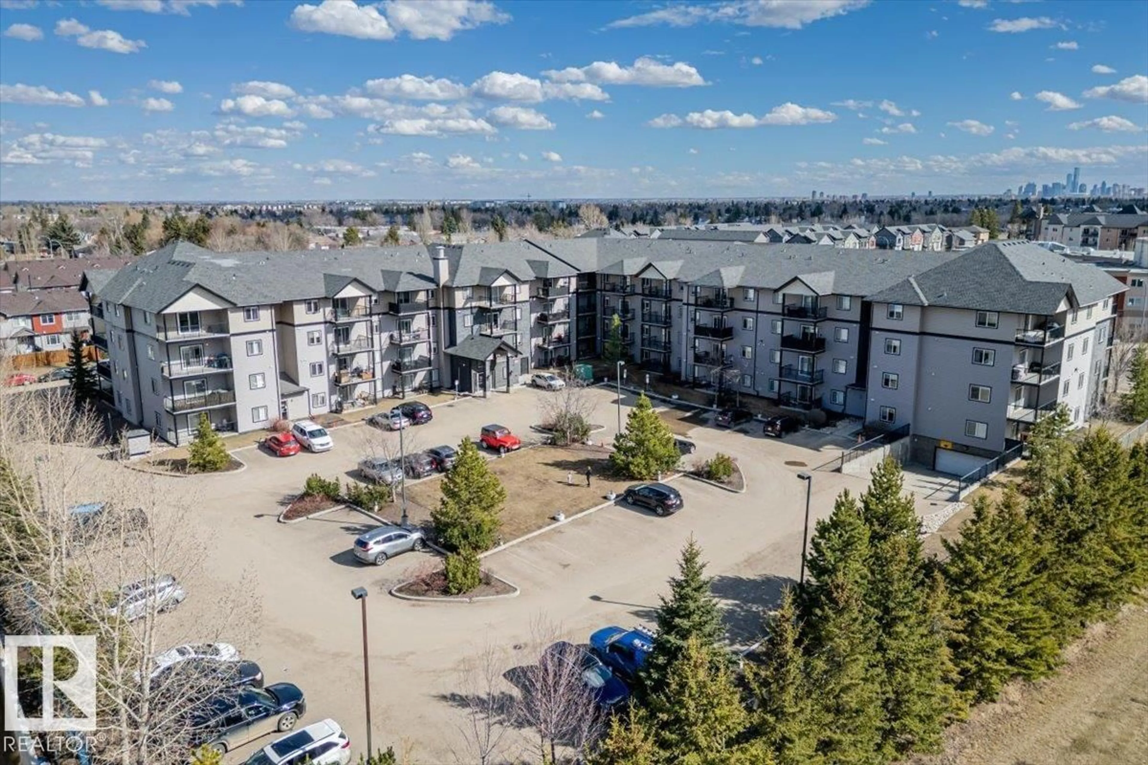 A pic from outside/outdoor area/front of a property/back of a property/a pic from drone, mountain view for 124 14808 125 ST NW, Edmonton Alberta T5X0G1