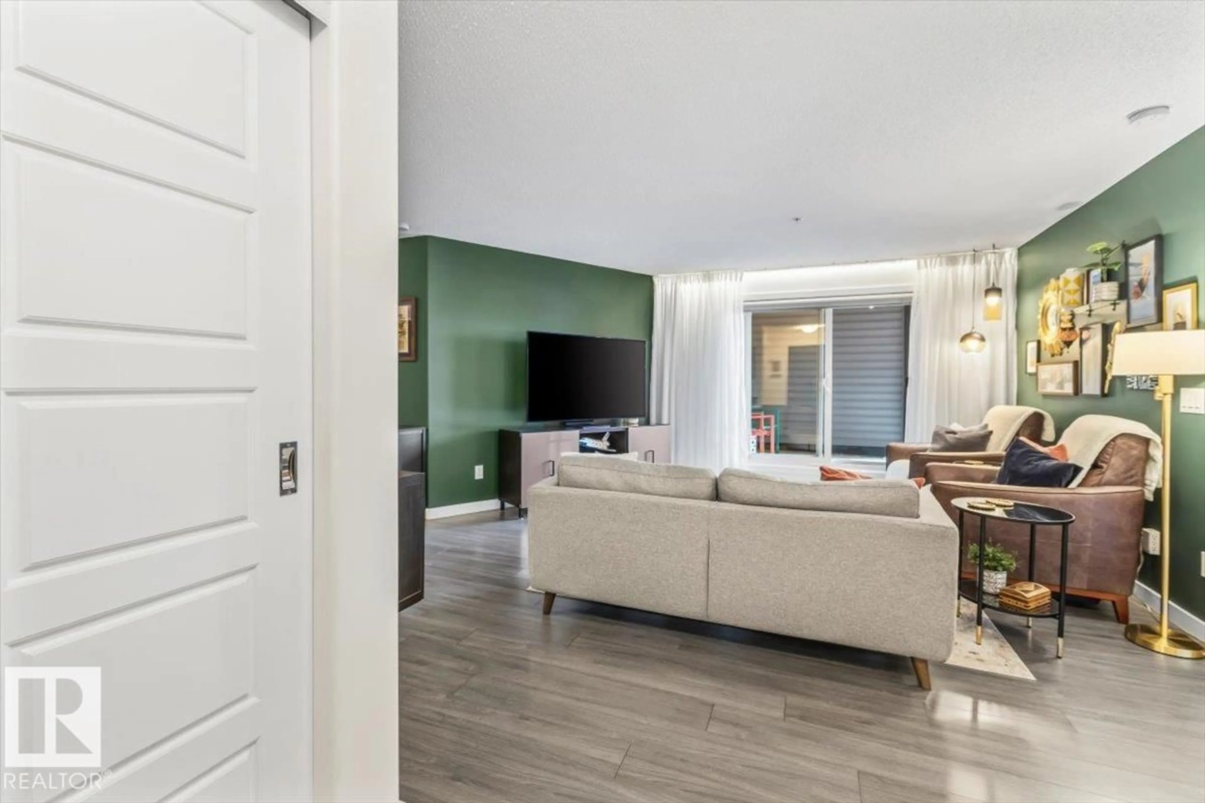 Living room with furniture, unknown for 124 14808 125 ST NW, Edmonton Alberta T5X0G1