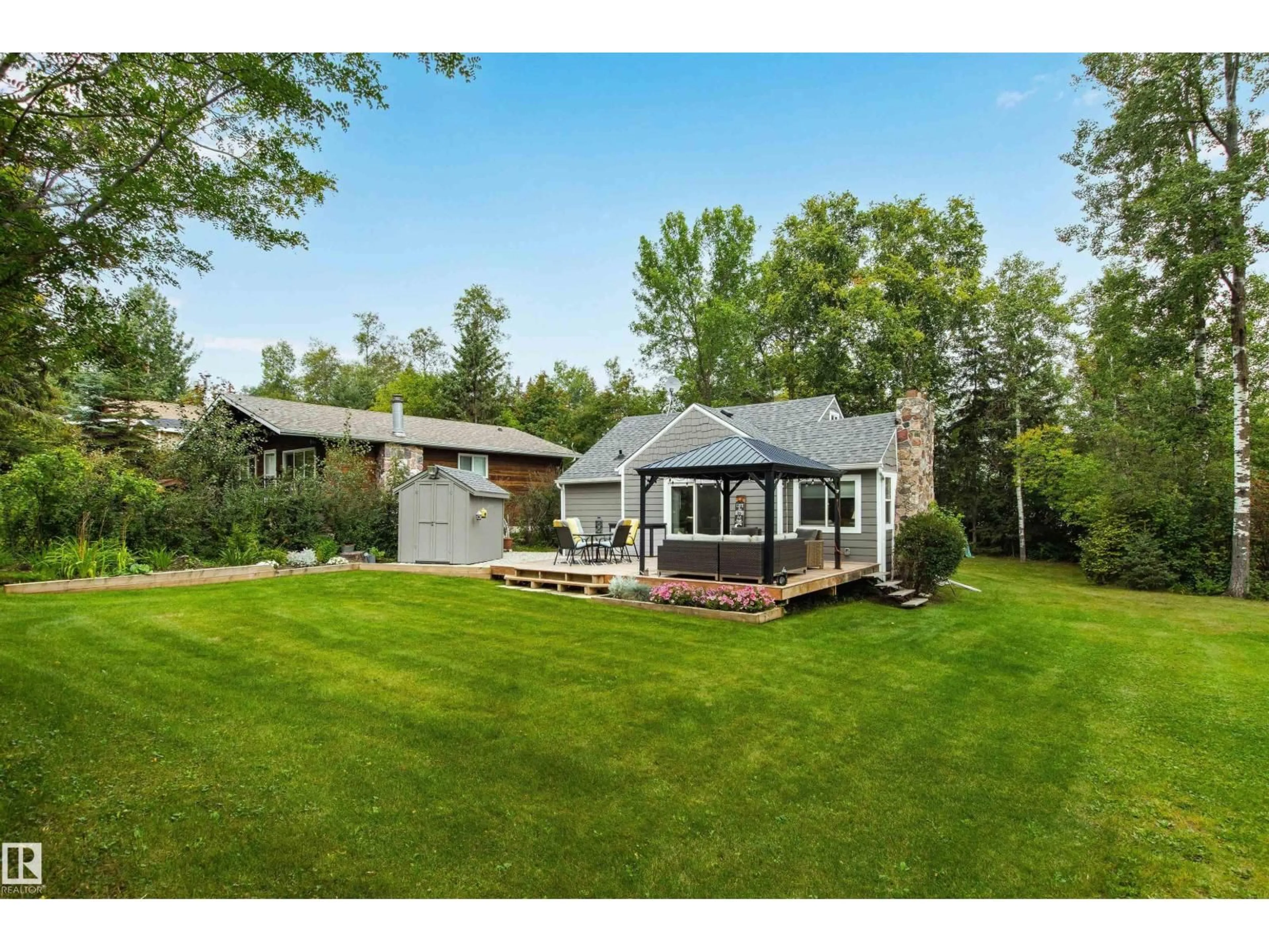 A pic from outside/outdoor area/front of a property/back of a property/a pic from drone, unknown for S - 116 & 118 6 STREET, Rural Parkland County Alberta T0E2B0