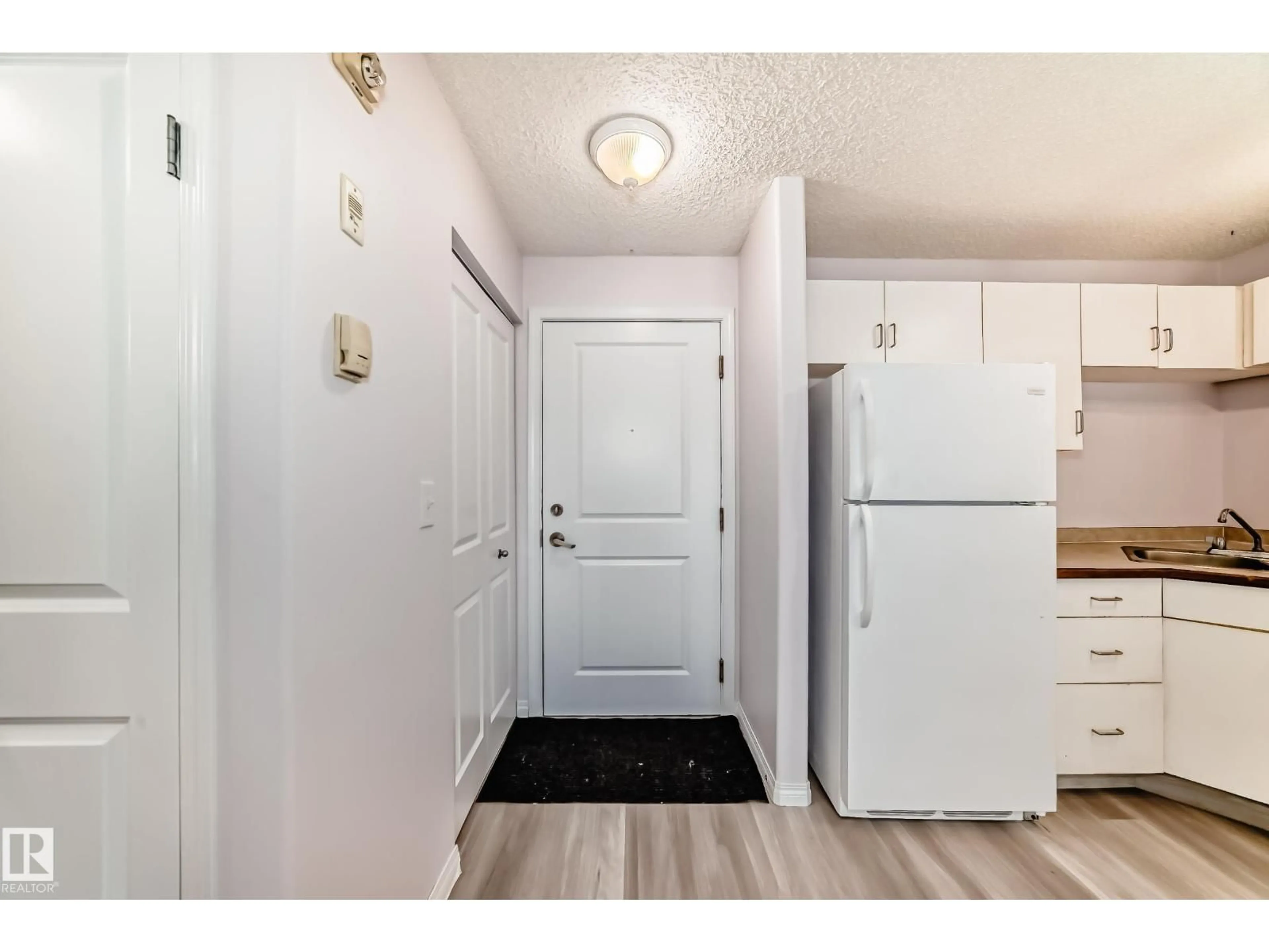 Indoor entryway for #218 - 10535 122 ST, Edmonton Alberta T5N4B7