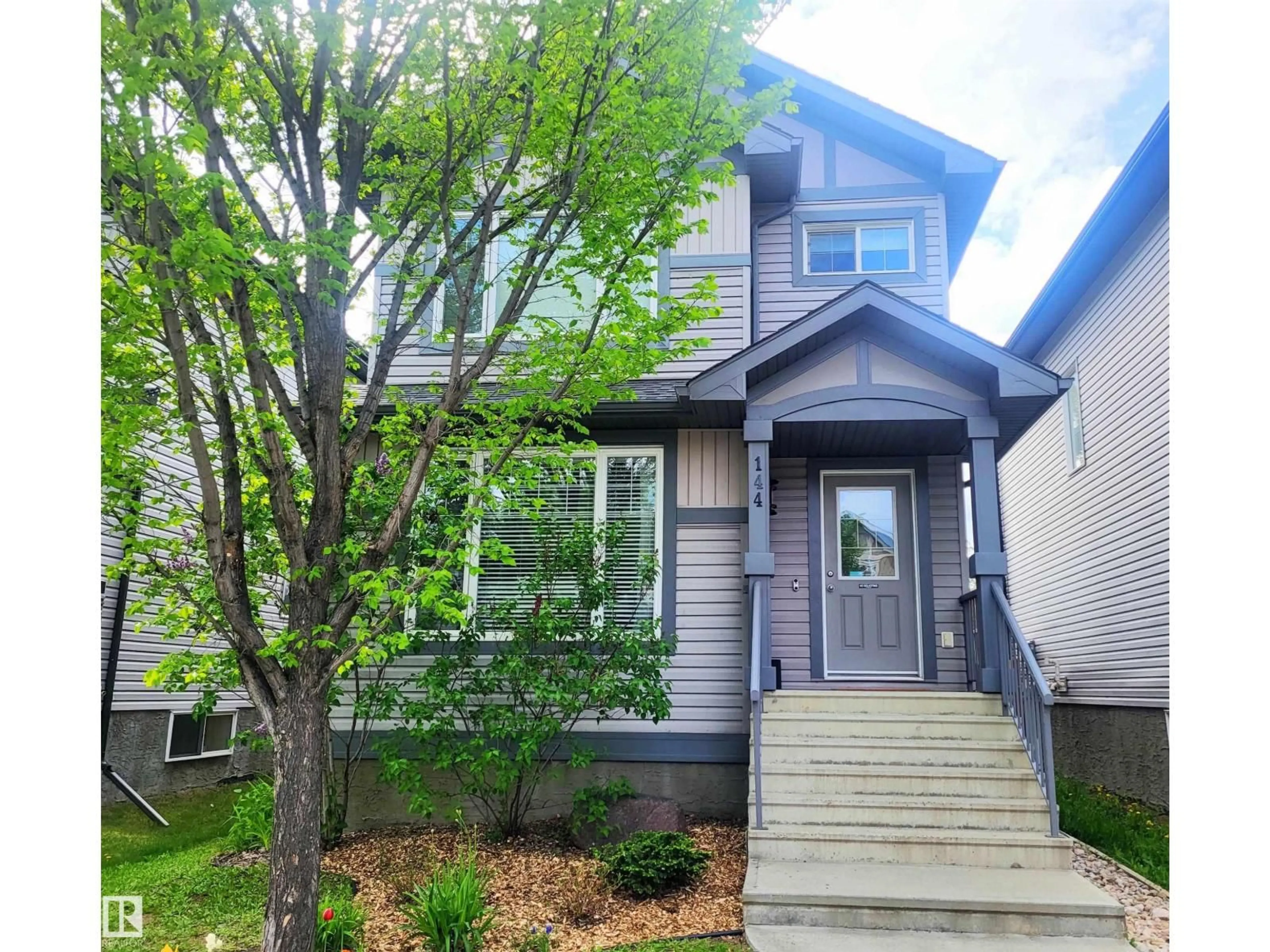 Home with vinyl exterior material, street for 144 KIRPATRICK WY, Leduc Alberta T9E0Z2