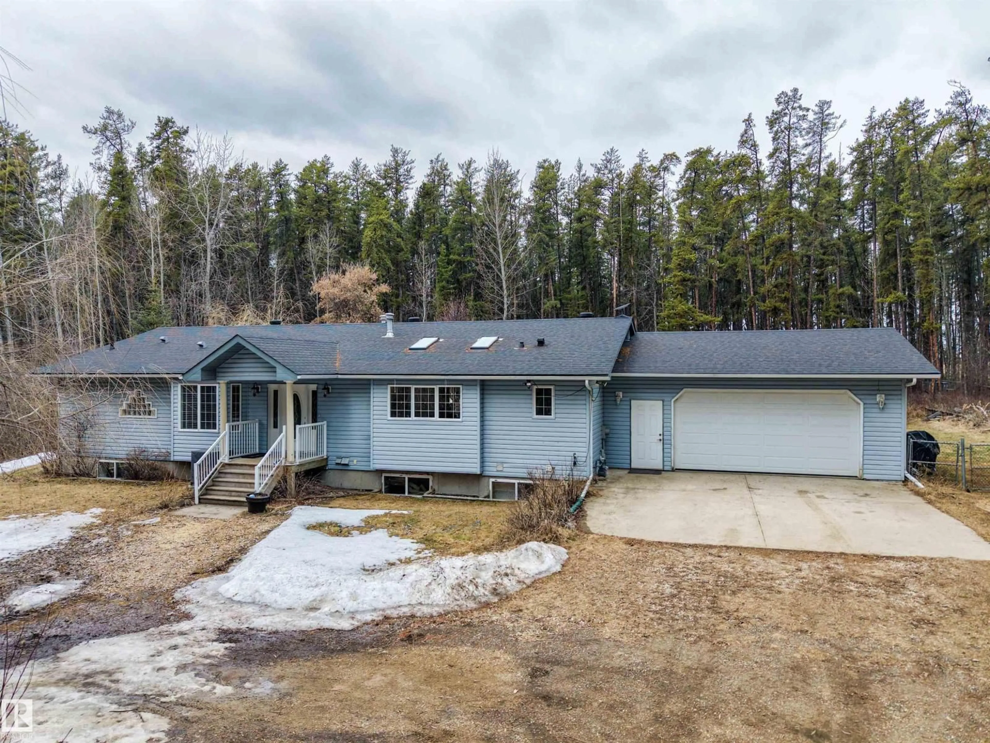 A pic from outside/outdoor area/front of a property/back of a property/a pic from drone, unknown for 51515 - 18 RGE ROAD 32 A, Rural Parkland County Alberta T0E0N0