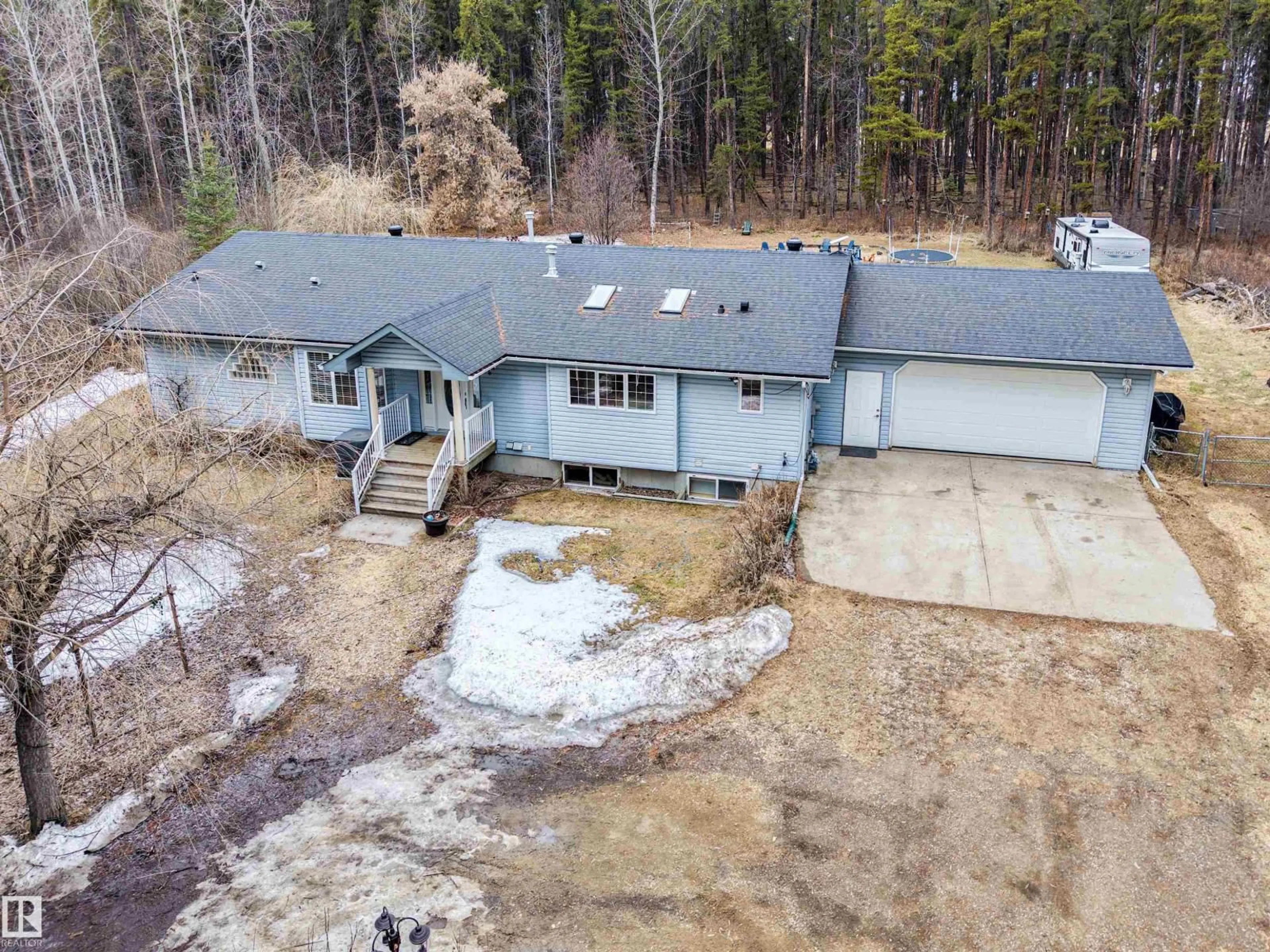 A pic from outside/outdoor area/front of a property/back of a property/a pic from drone, unknown for 51515 - 18 RGE ROAD 32 A, Rural Parkland County Alberta T0E0N0