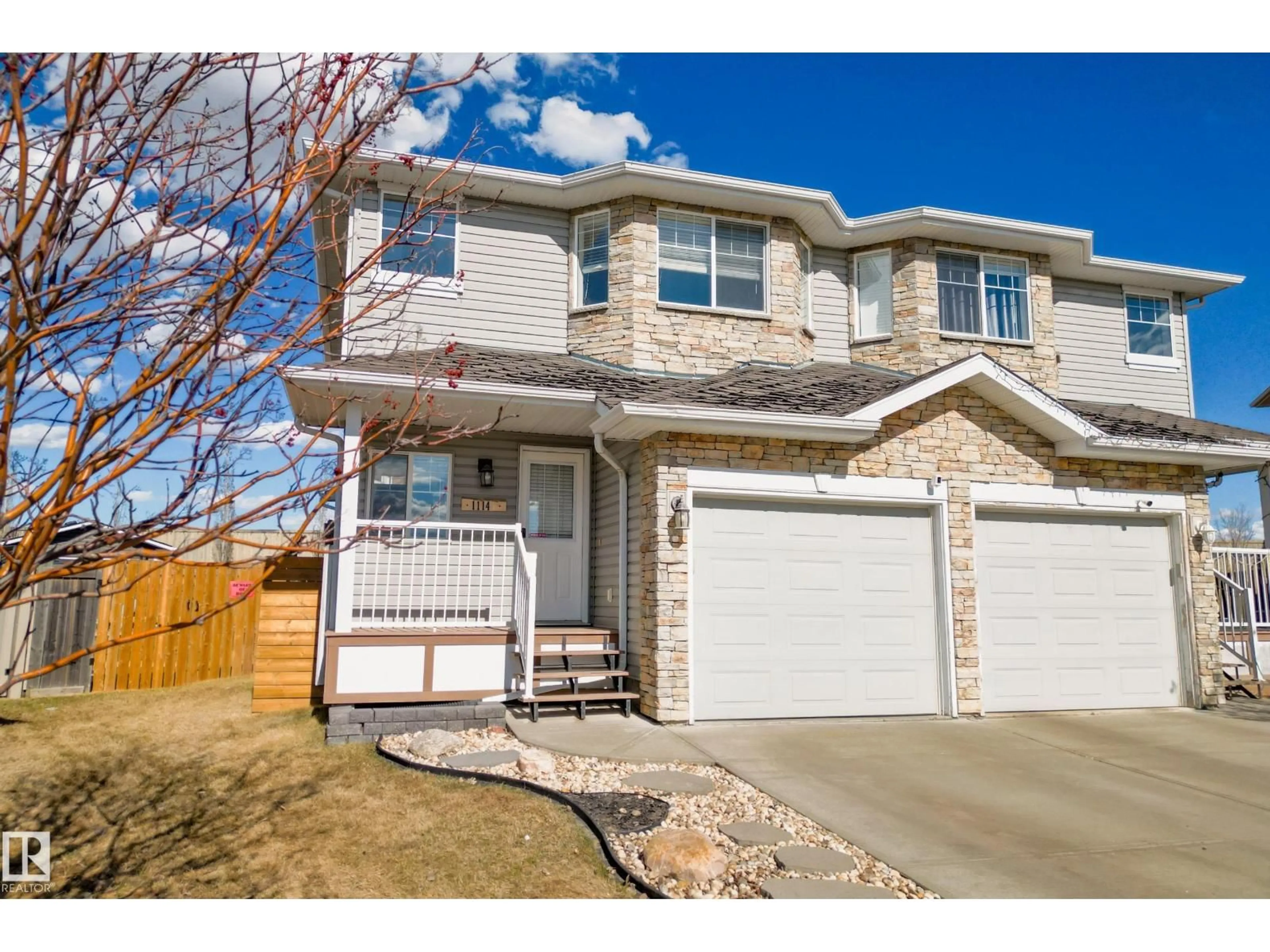 Home with vinyl exterior material, street for 1114 37B AV, Edmonton Alberta T6T0E6