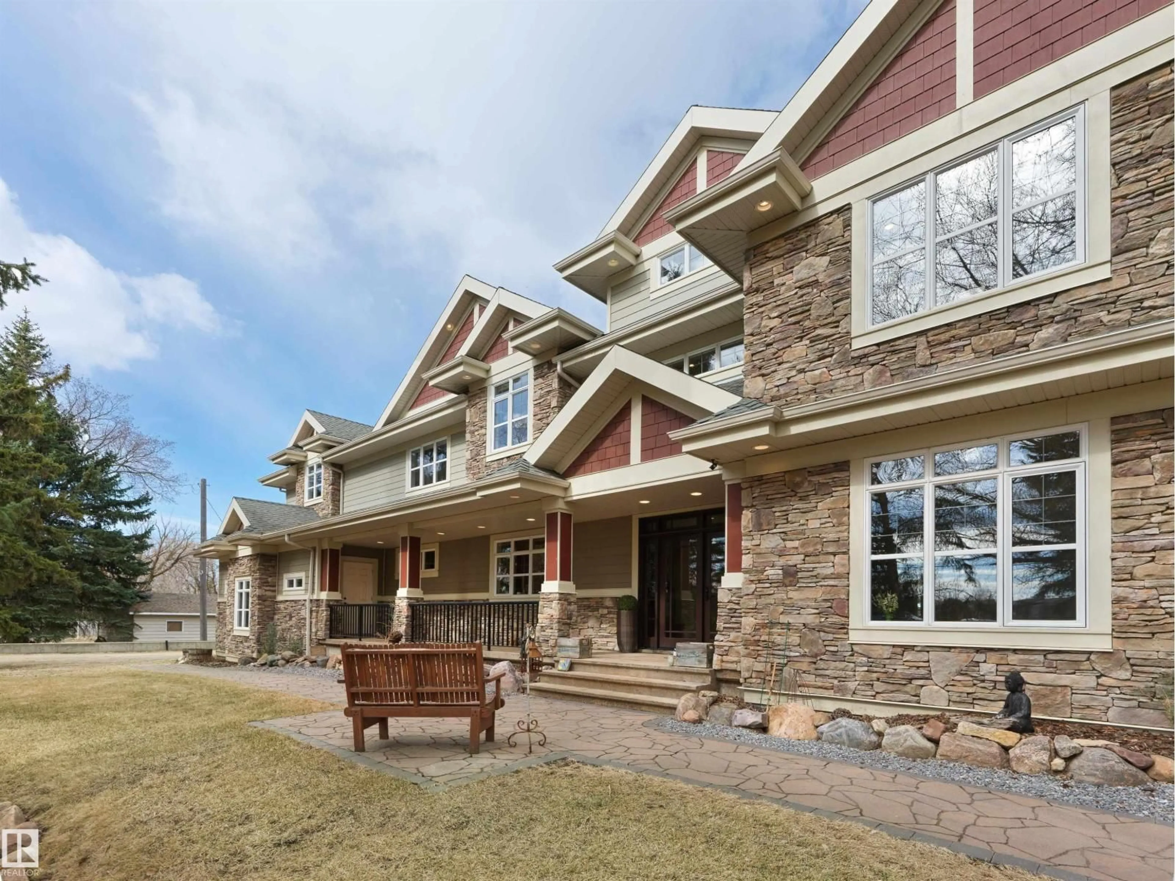 Home with brick exterior material, mountain view for 112 WINDERMERE DR, Edmonton Alberta T6W0S4