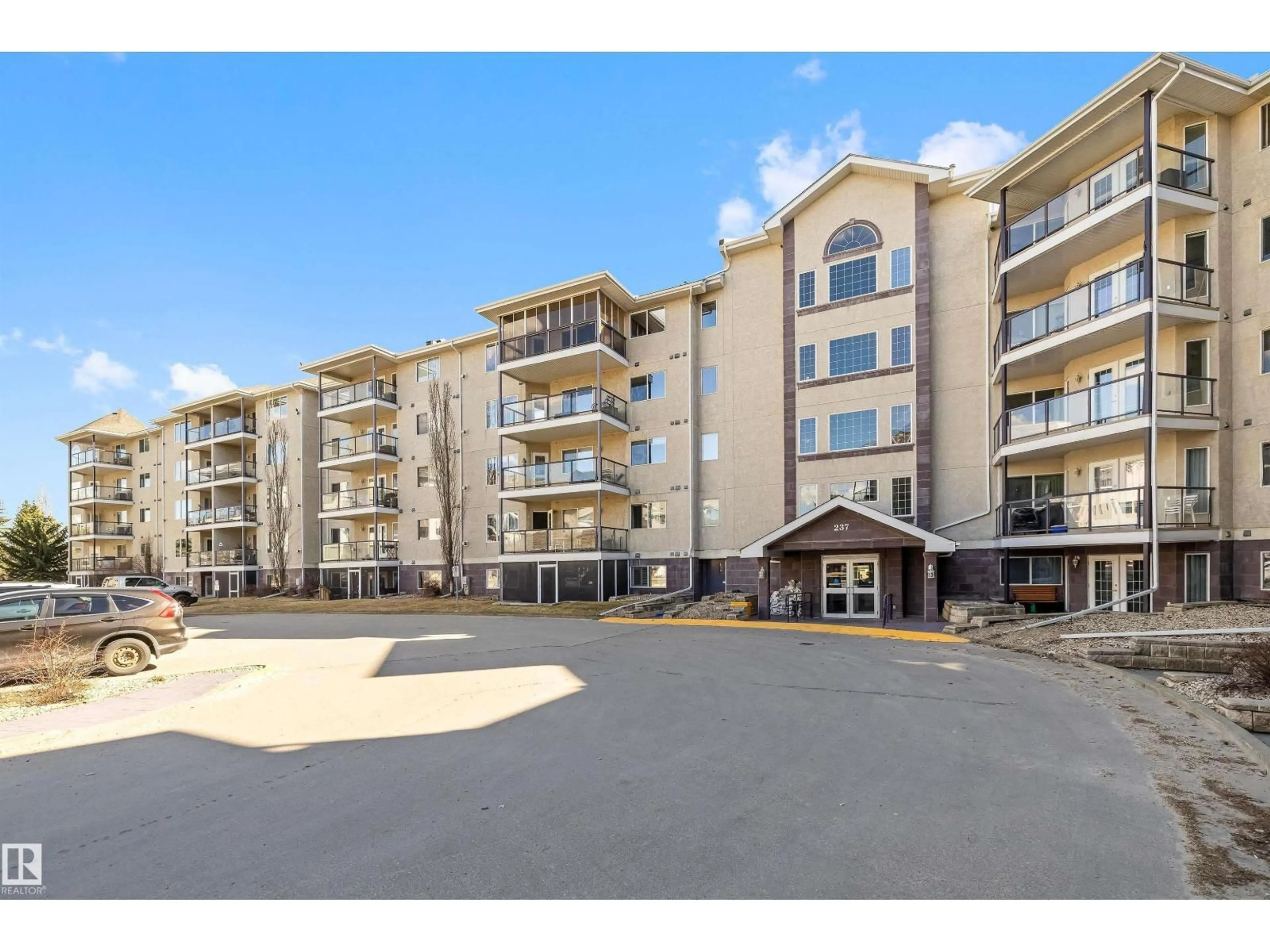 A pic from outside/outdoor area/front of a property/back of a property/a pic from drone, unknown for 237 - 214 YOUVILLE DR E NW, Edmonton Alberta T6L7G2