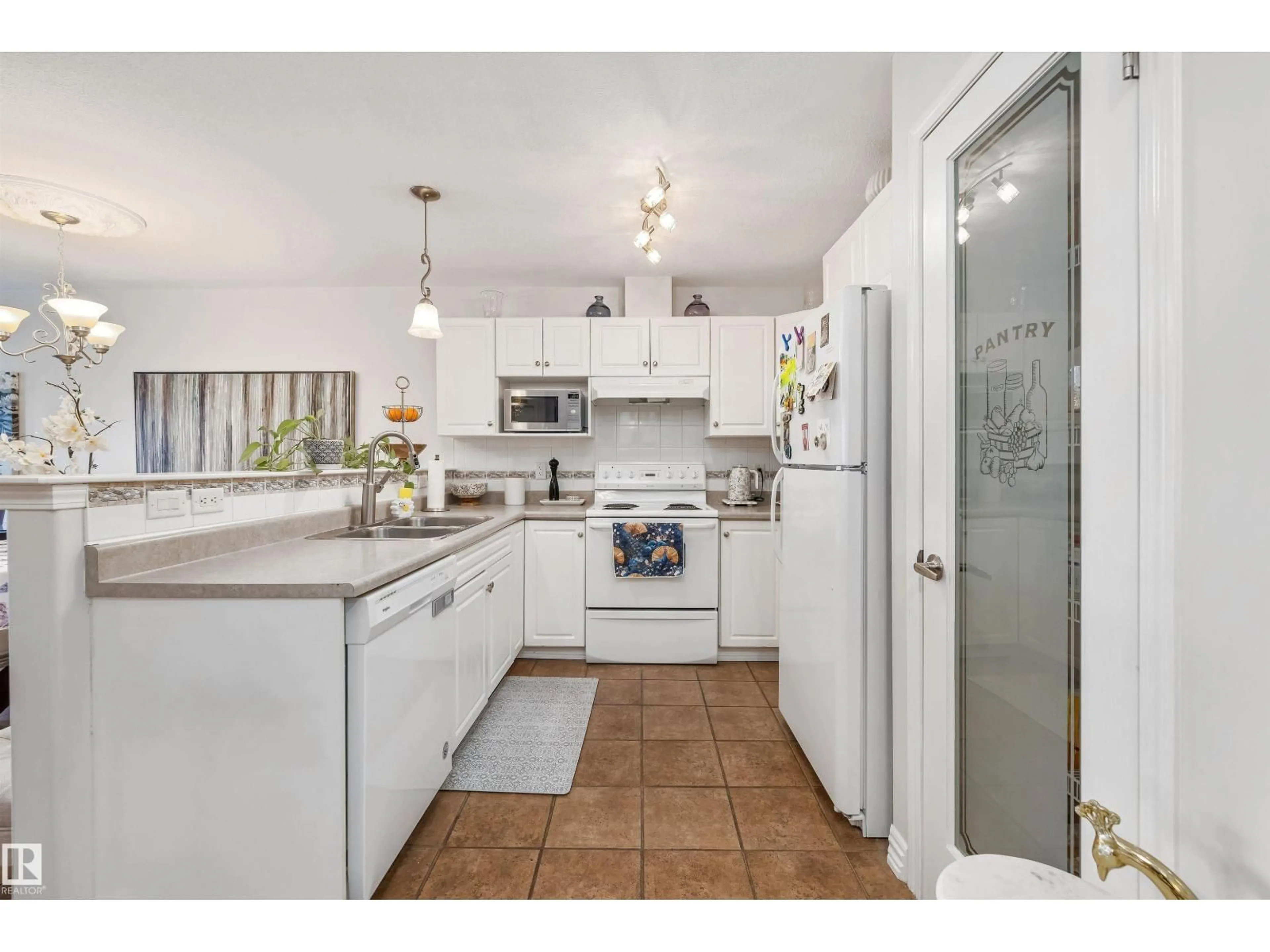 Standard kitchen, ceramic/tile floor for 237 - 214 YOUVILLE DR E NW, Edmonton Alberta T6L7G2