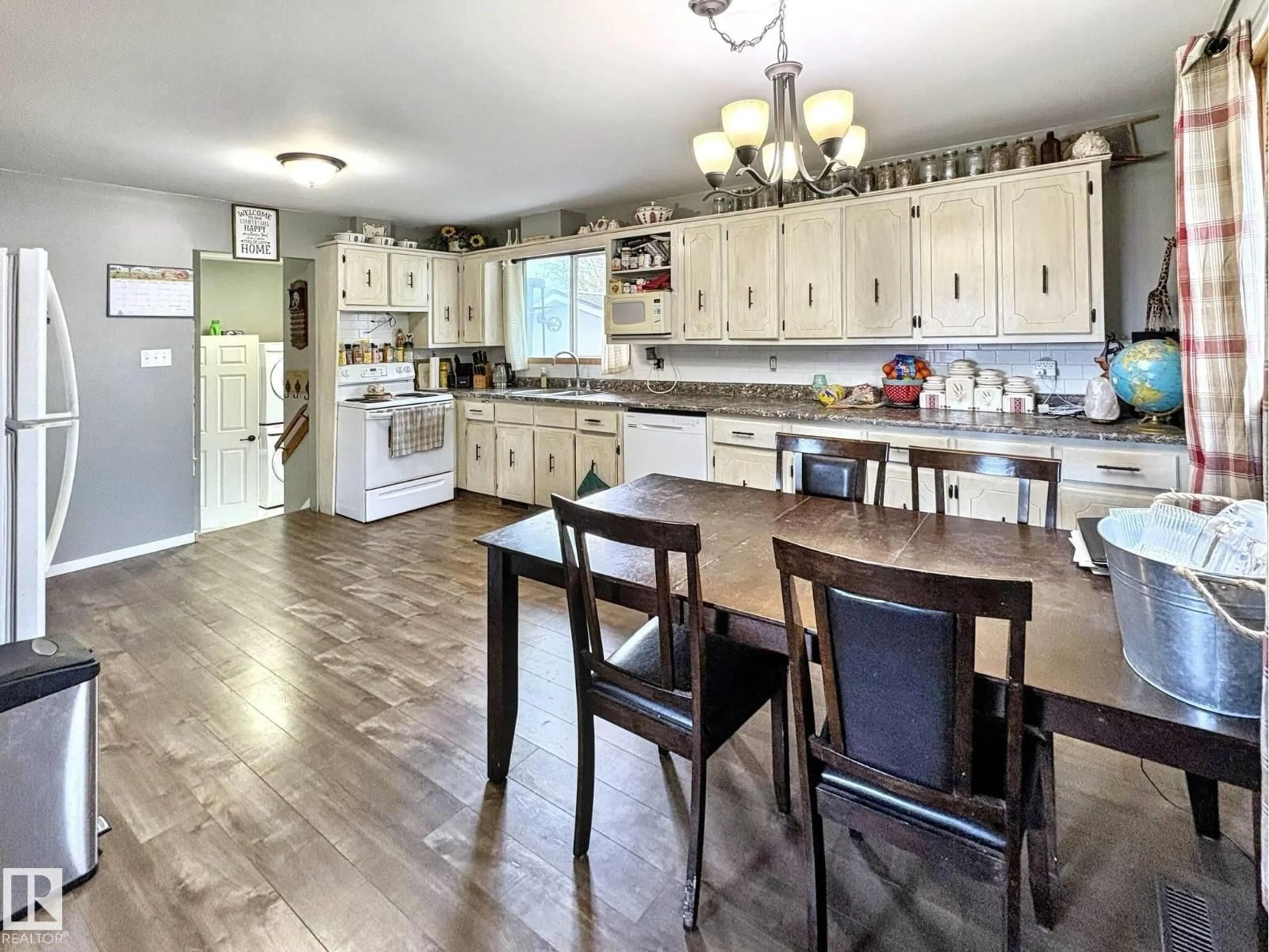Open concept kitchen, wood/laminate floor for 5025 54 ST, Glendon Alberta T0A1P0