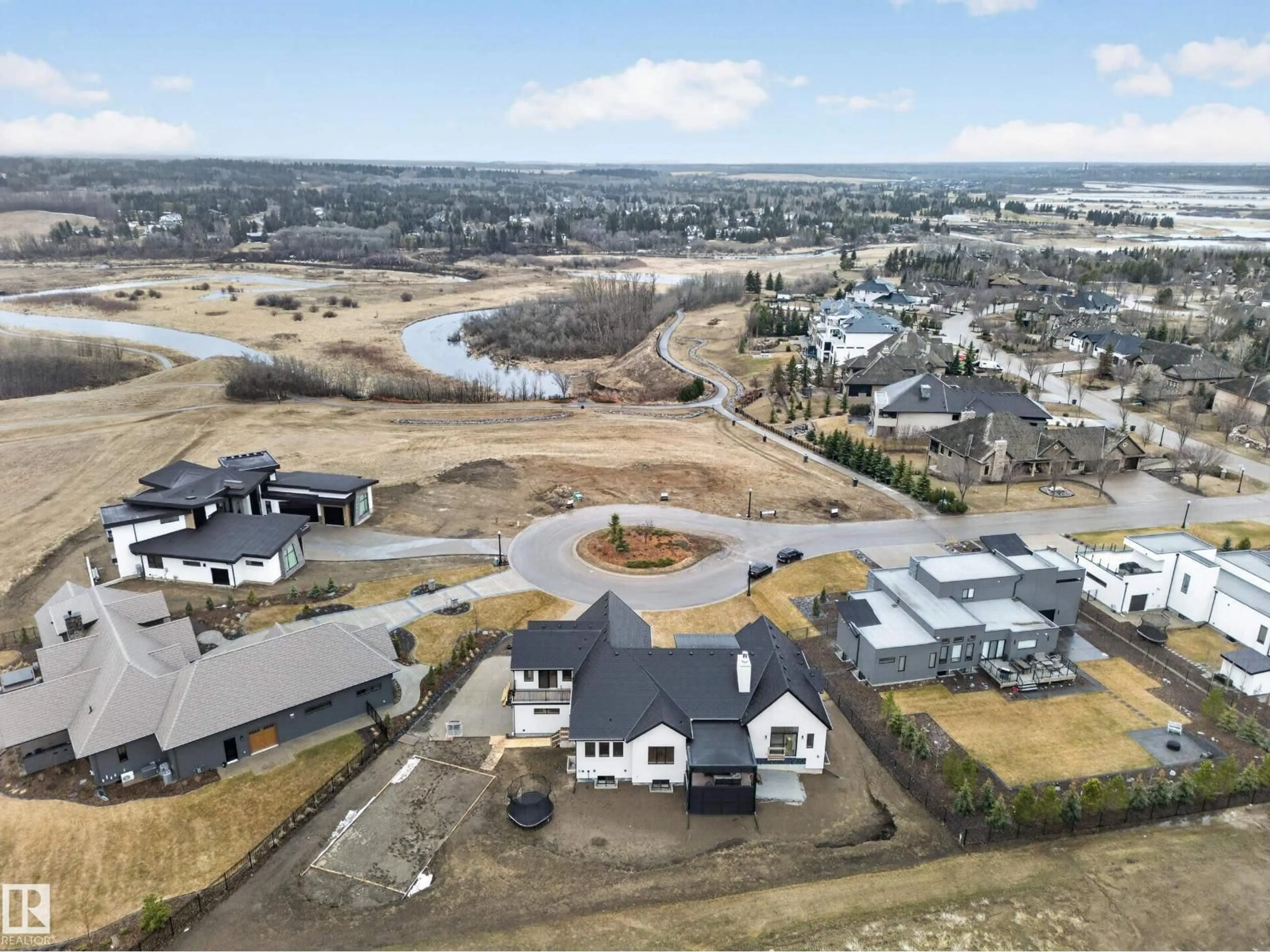 A pic from outside/outdoor area/front of a property/back of a property/a pic from drone, water/lake/river/ocean view for 68 54403 RGE ROAD 251, Rural Sturgeon County Alberta T5T0B5