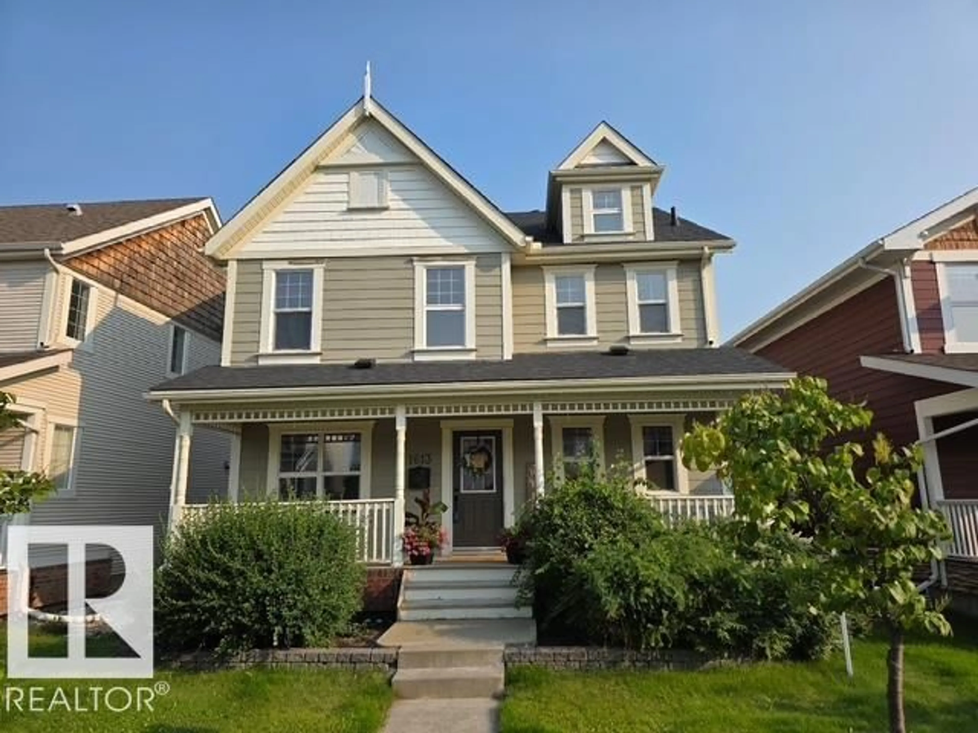 Home with vinyl exterior material, street for 1613 KERR RD, Edmonton Alberta T5E4P6