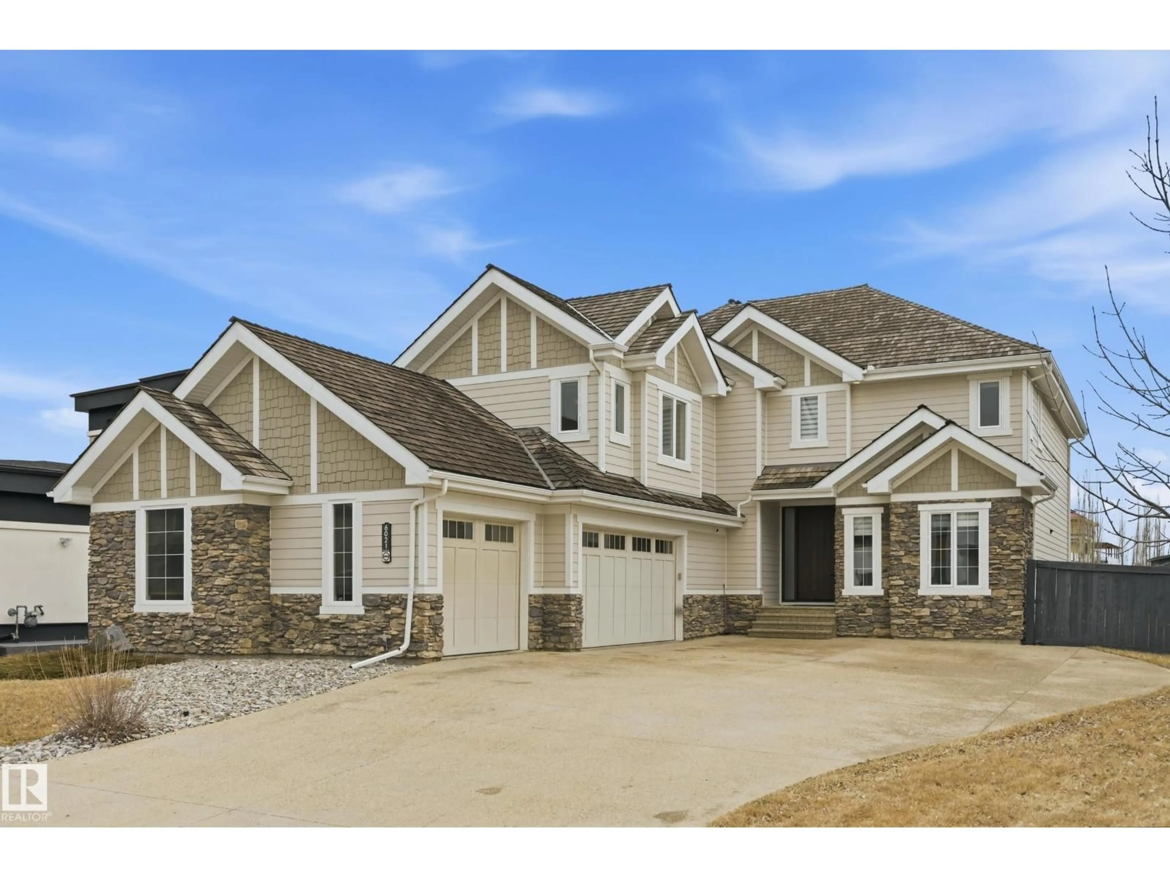 Home with vinyl exterior material, street for 6021 30 ST, Rural Leduc County Alberta T4X0X4