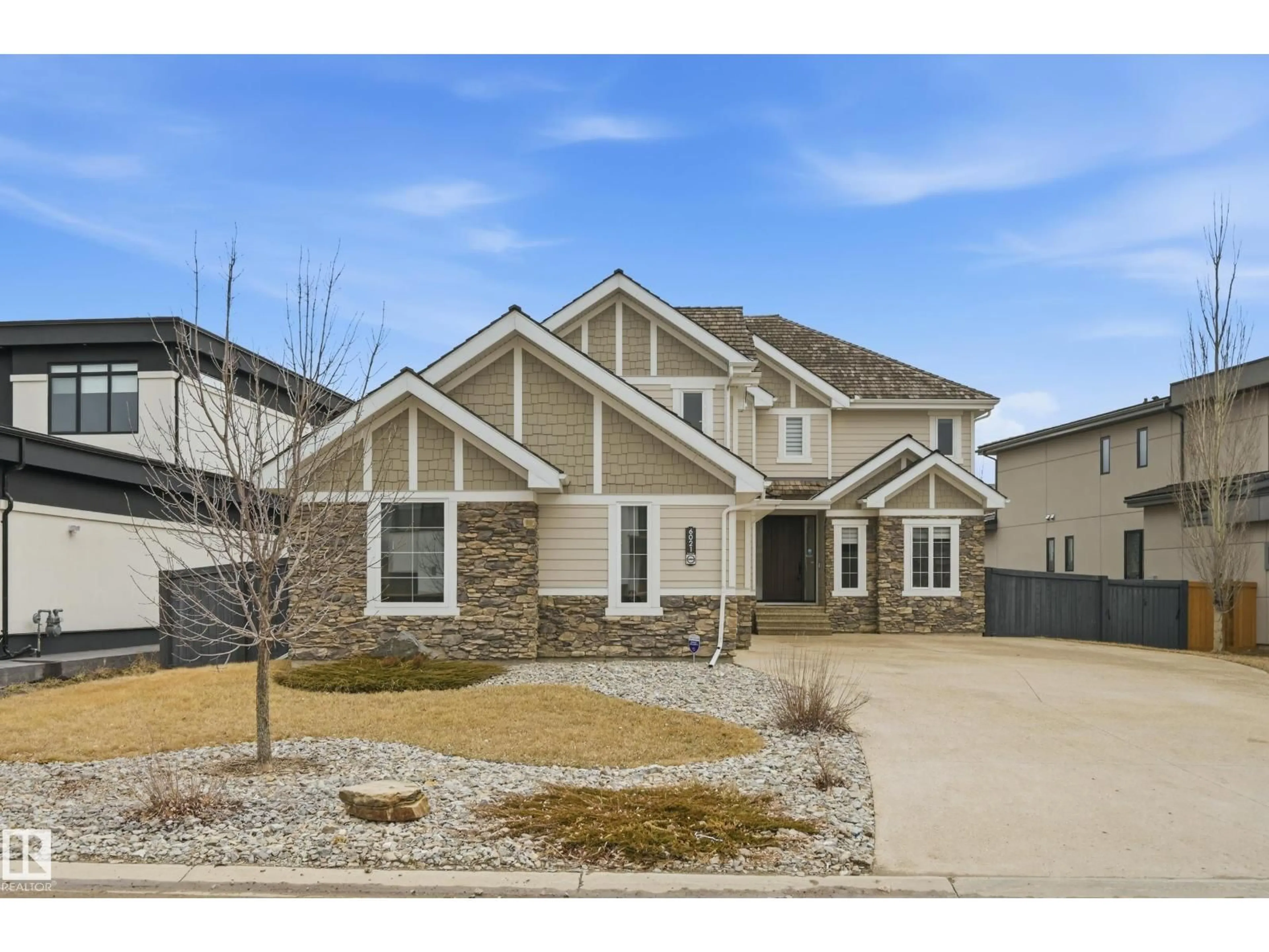 Home with vinyl exterior material, street for 6021 30 ST, Rural Leduc County Alberta T4X0X4