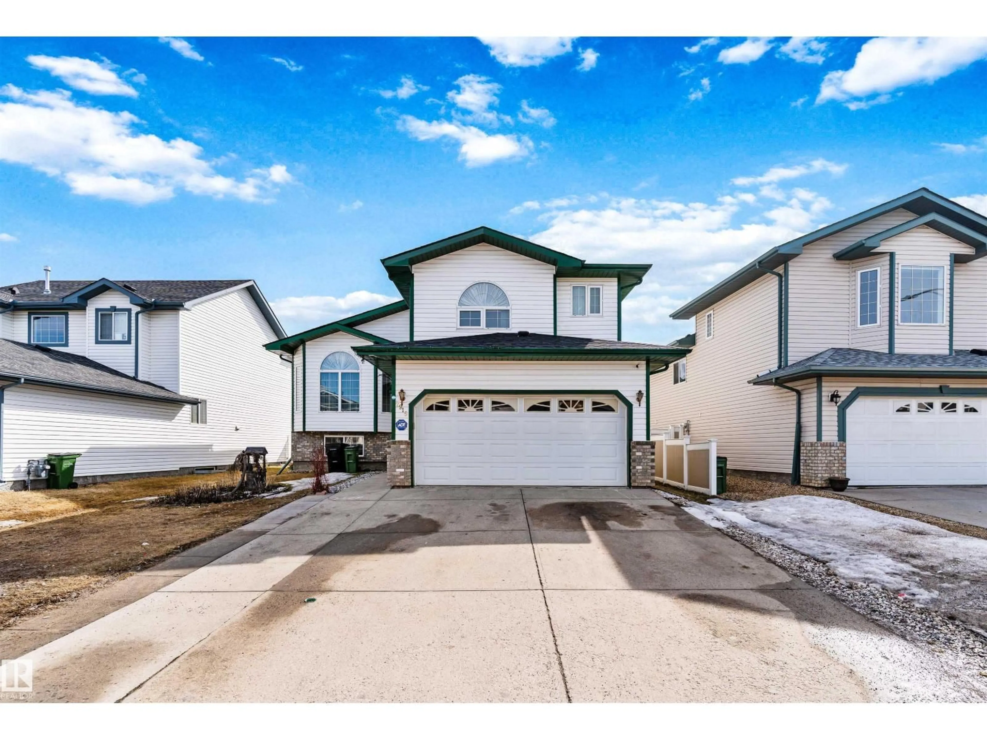 Home with vinyl exterior material, street for 2915 151A AV, Edmonton Alberta T5Y2Y5