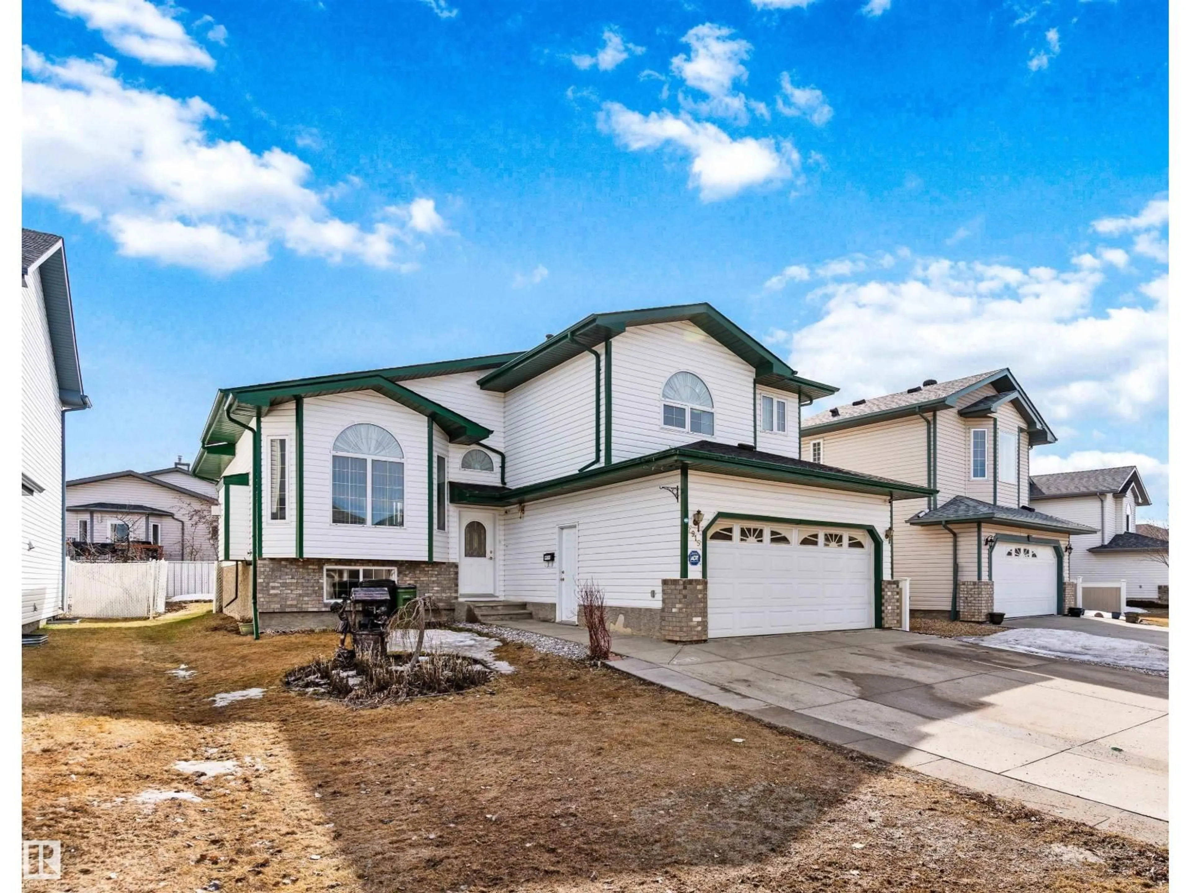 Home with vinyl exterior material, street for 2915 151A AV, Edmonton Alberta T5Y2Y5