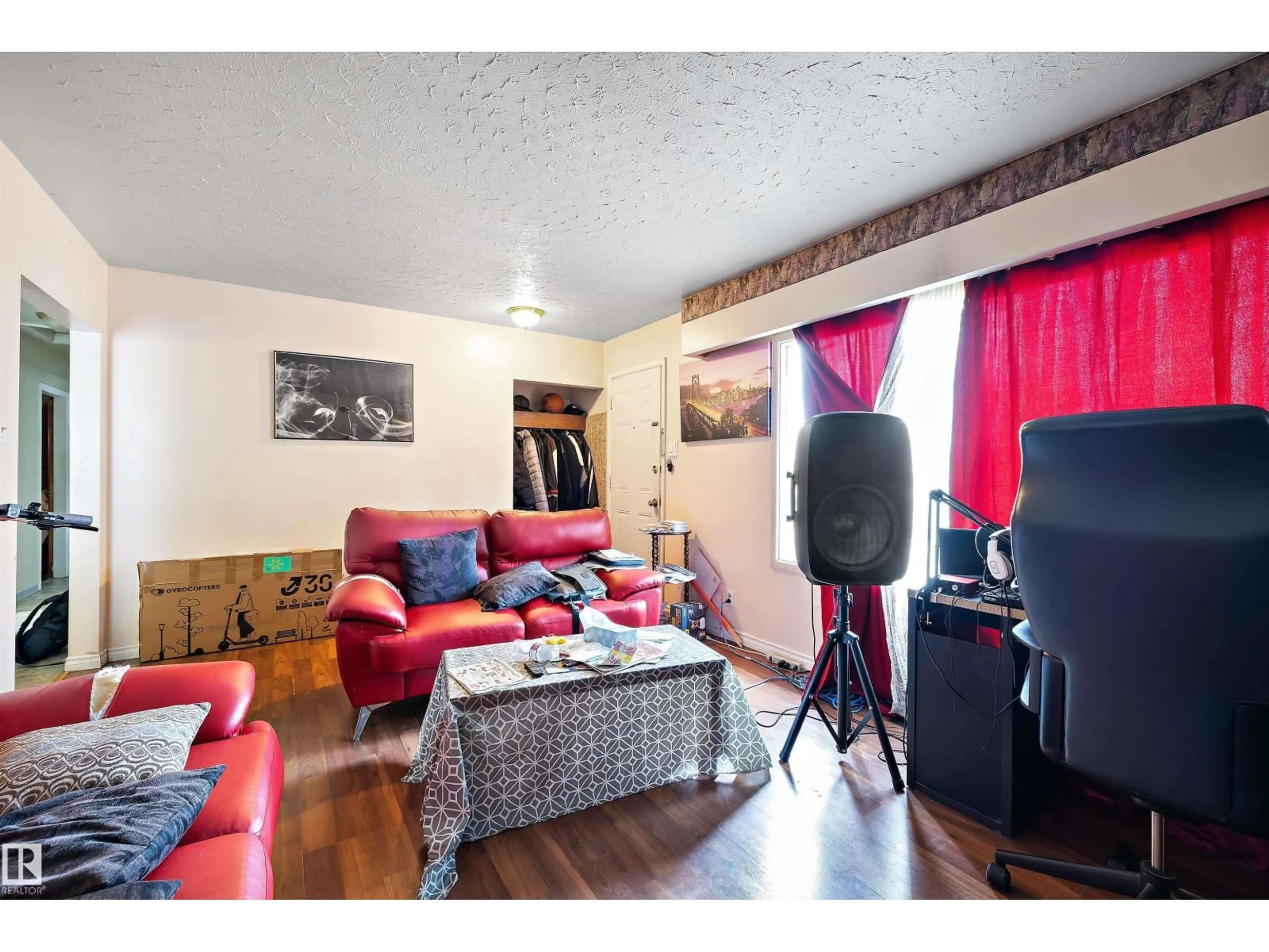 Living room with furniture, wood/laminate floor for 13136 60 ST, Edmonton Alberta T5A0S3