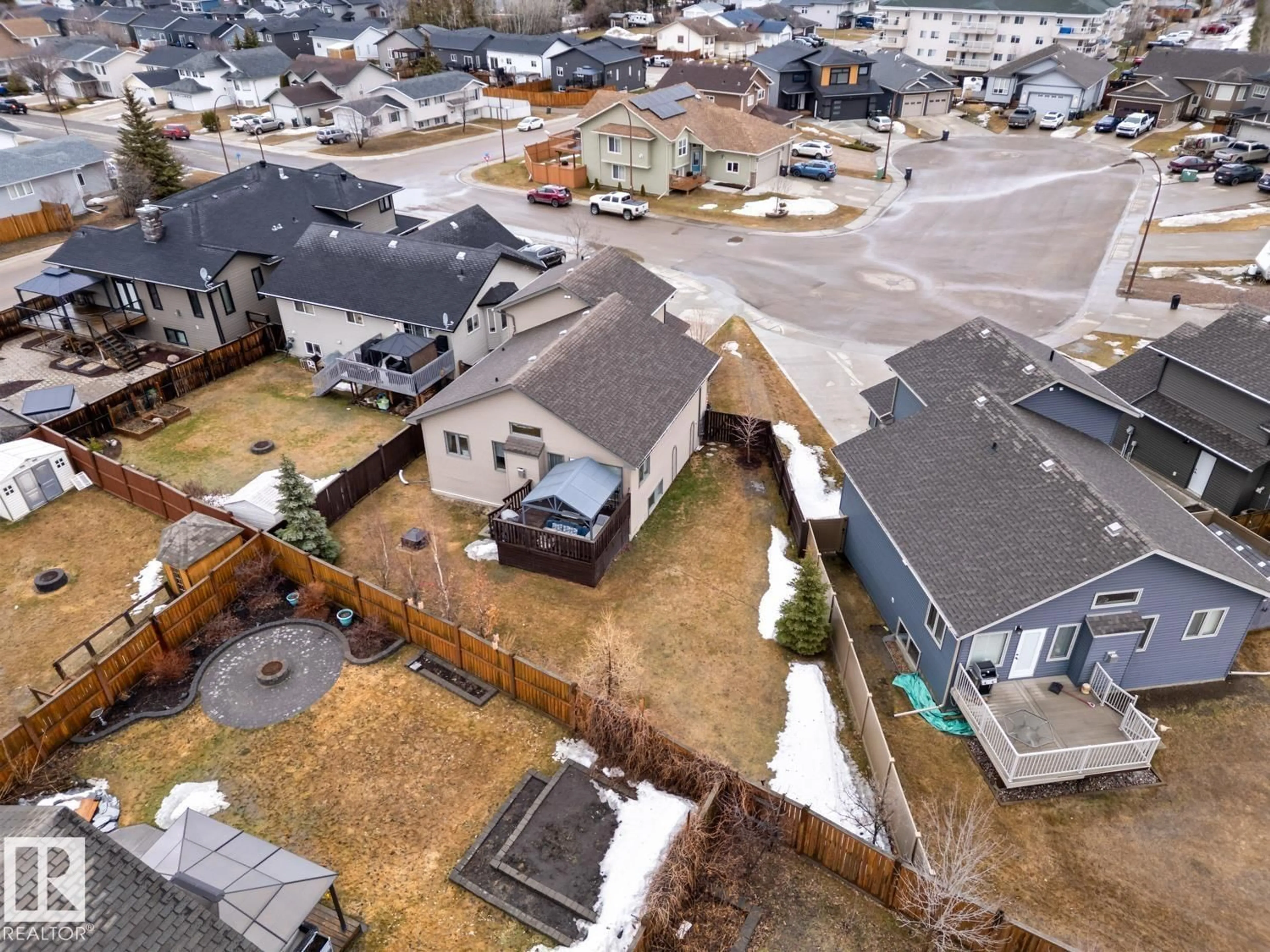 A pic from outside/outdoor area/front of a property/back of a property/a pic from drone, street for 705 PHEASANT CL, Cold Lake Alberta T9M0B7