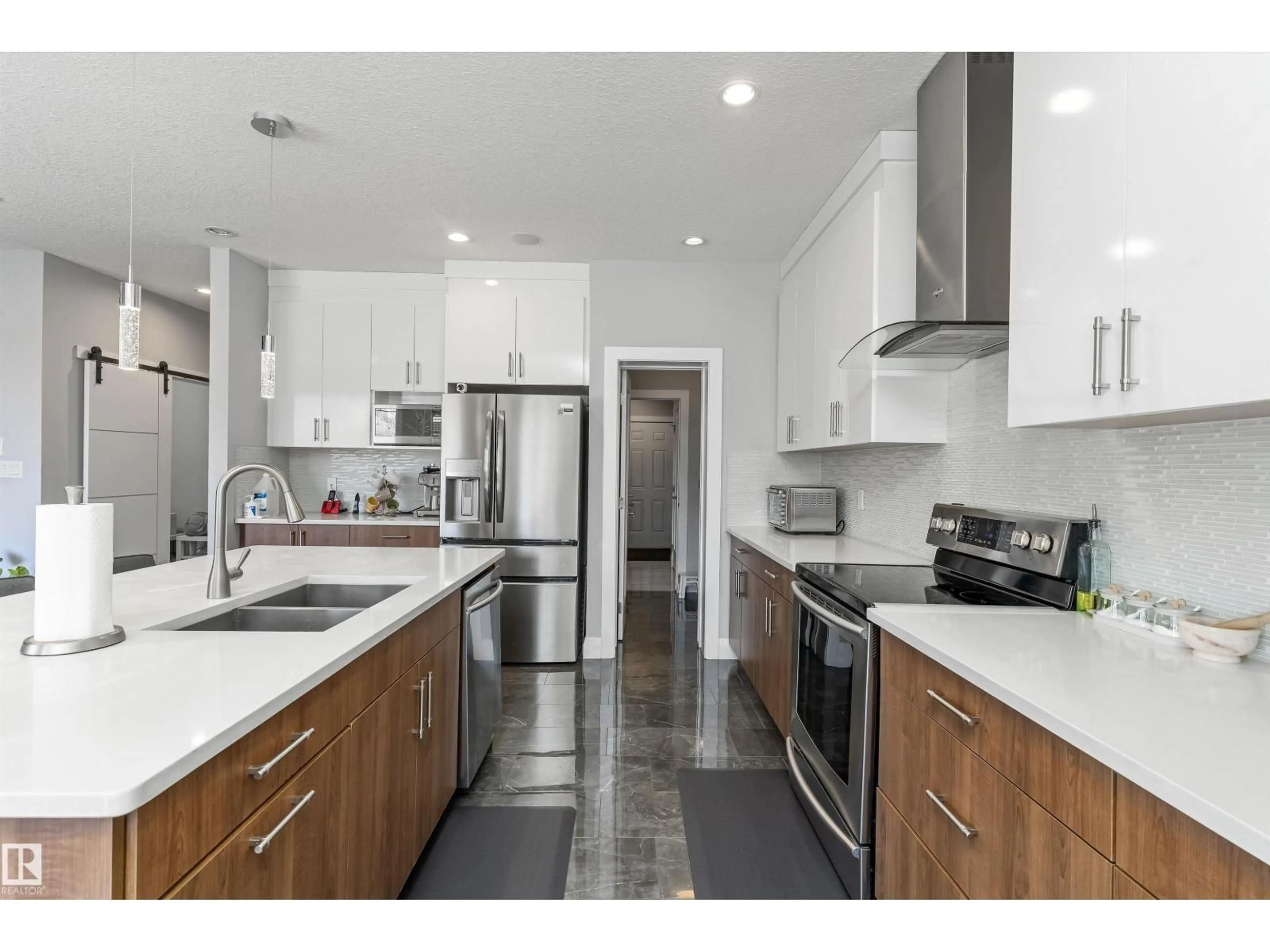 Open concept kitchen, unknown for NW - 18096 89 ST, Edmonton Alberta T5Z0J5