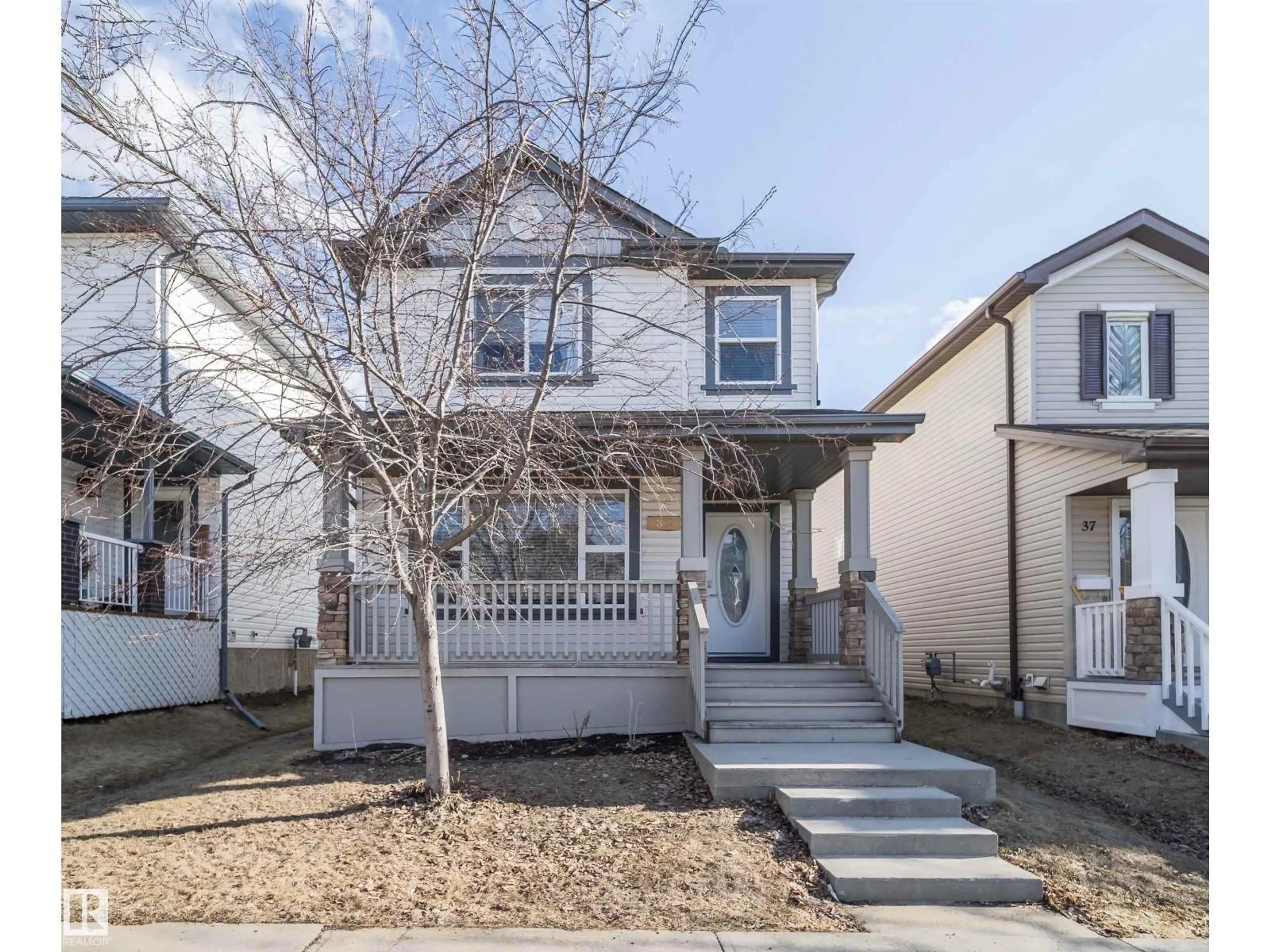 Home with vinyl exterior material, street for 39 VIRGINIA AV, Spruce Grove Alberta T7X0B9