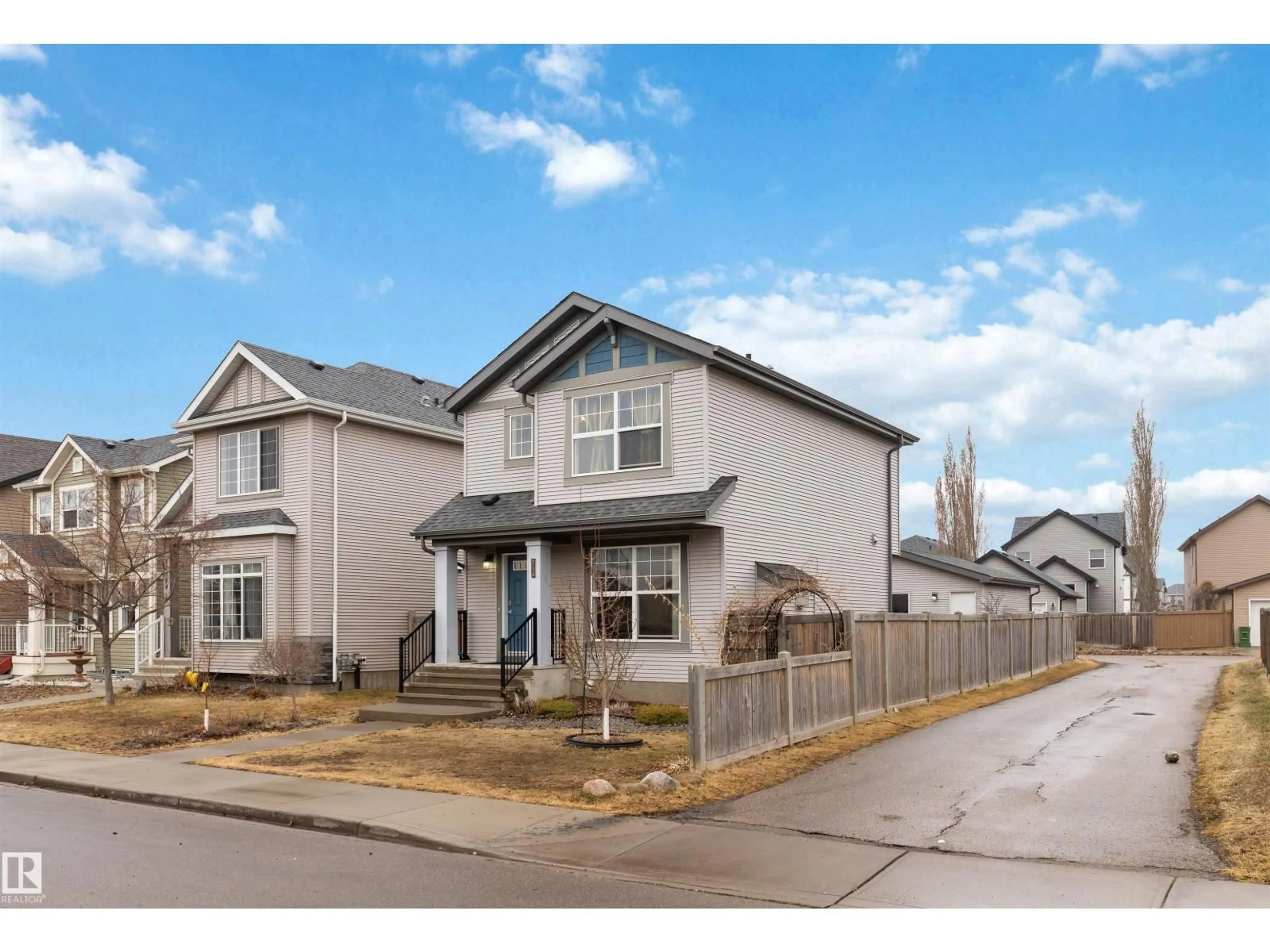 Home with vinyl exterior material, street for 17588 59 ST, Edmonton Alberta T5Y0W8