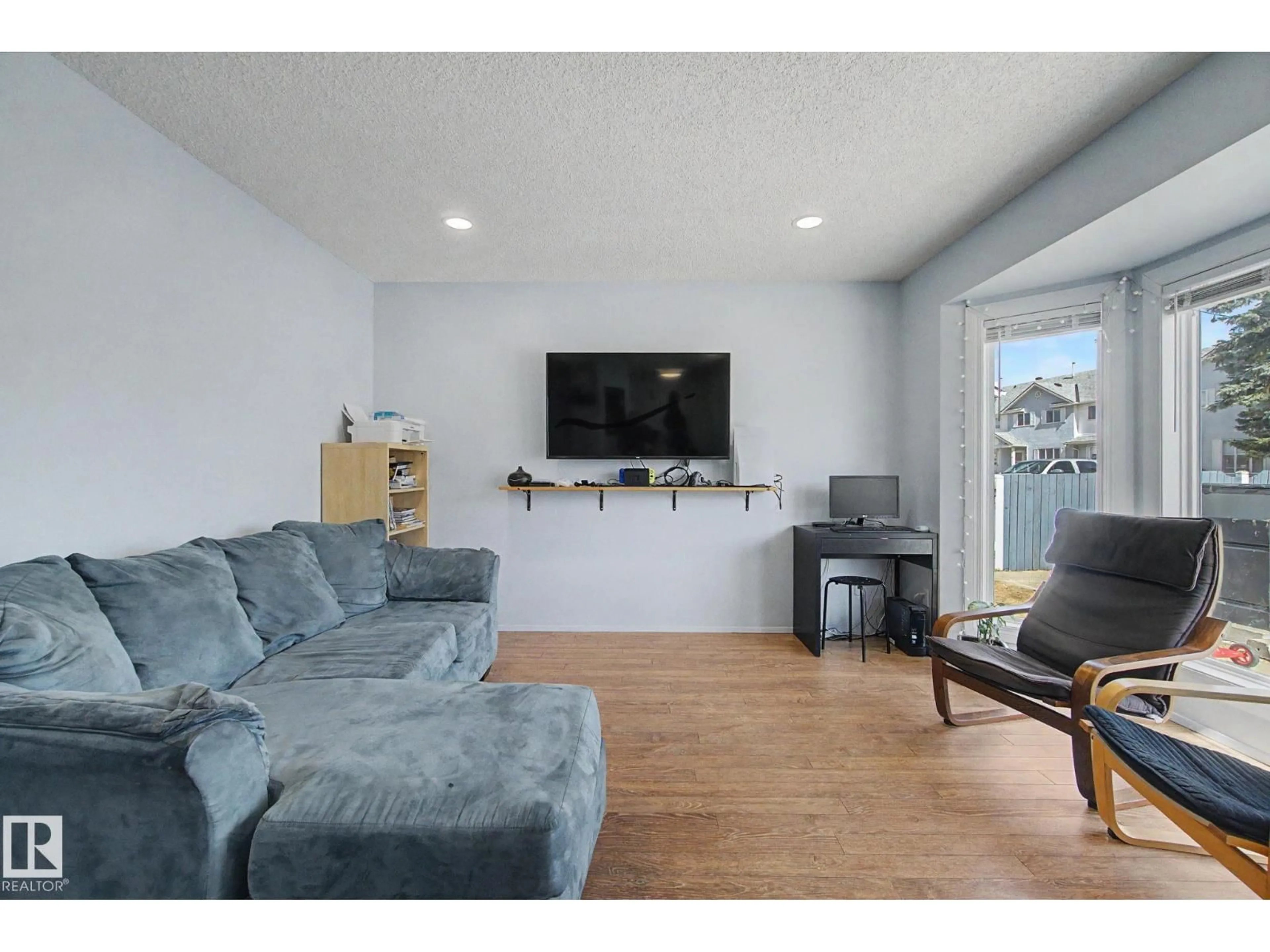 Living room with furniture, wood/laminate floor for 5 - 141 ABERDEEN WY, Stony Plain Alberta T7Z1N1