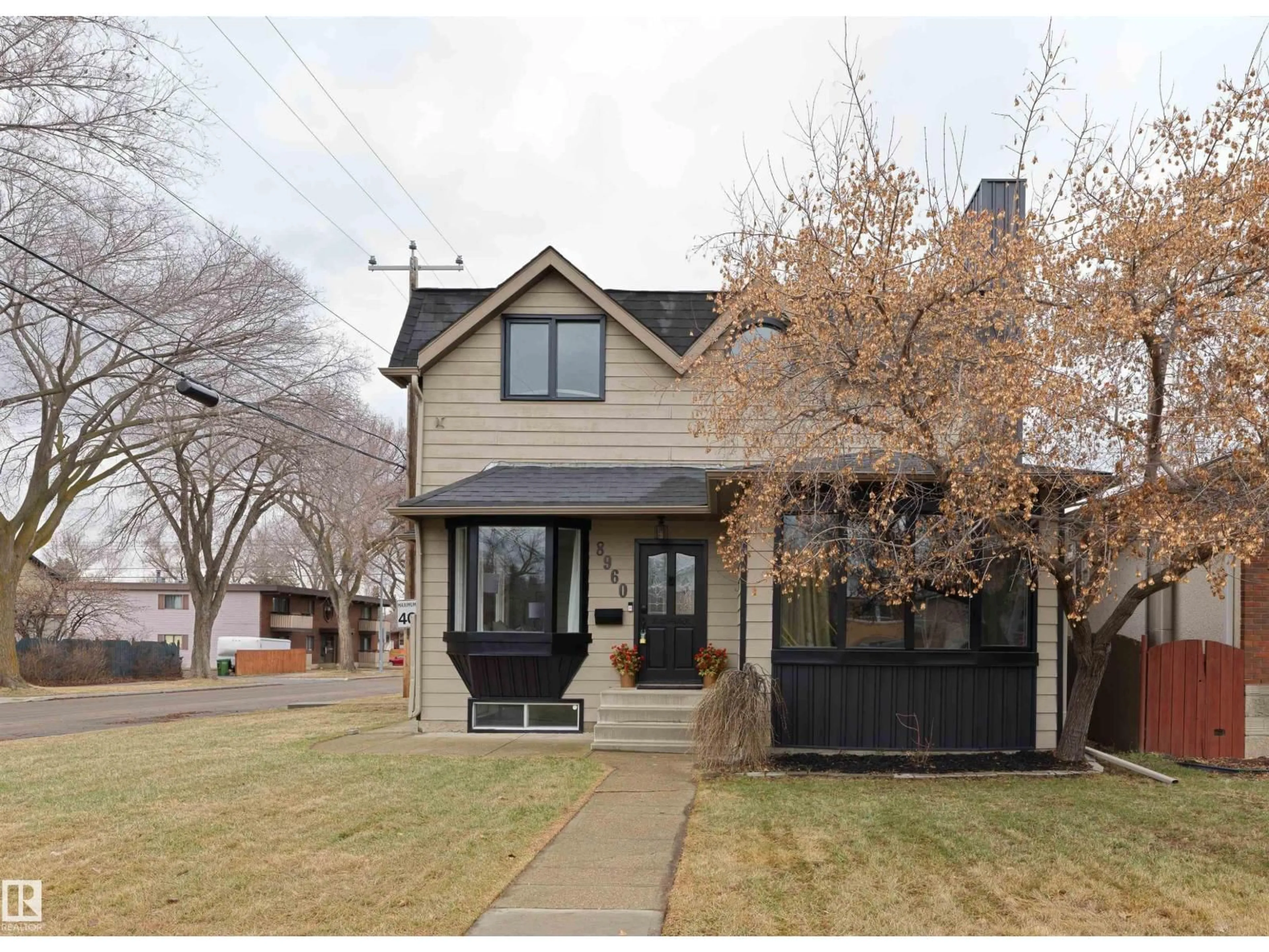 Home with brick exterior material, street for 8960 77 AV, Edmonton Alberta T6C0L9