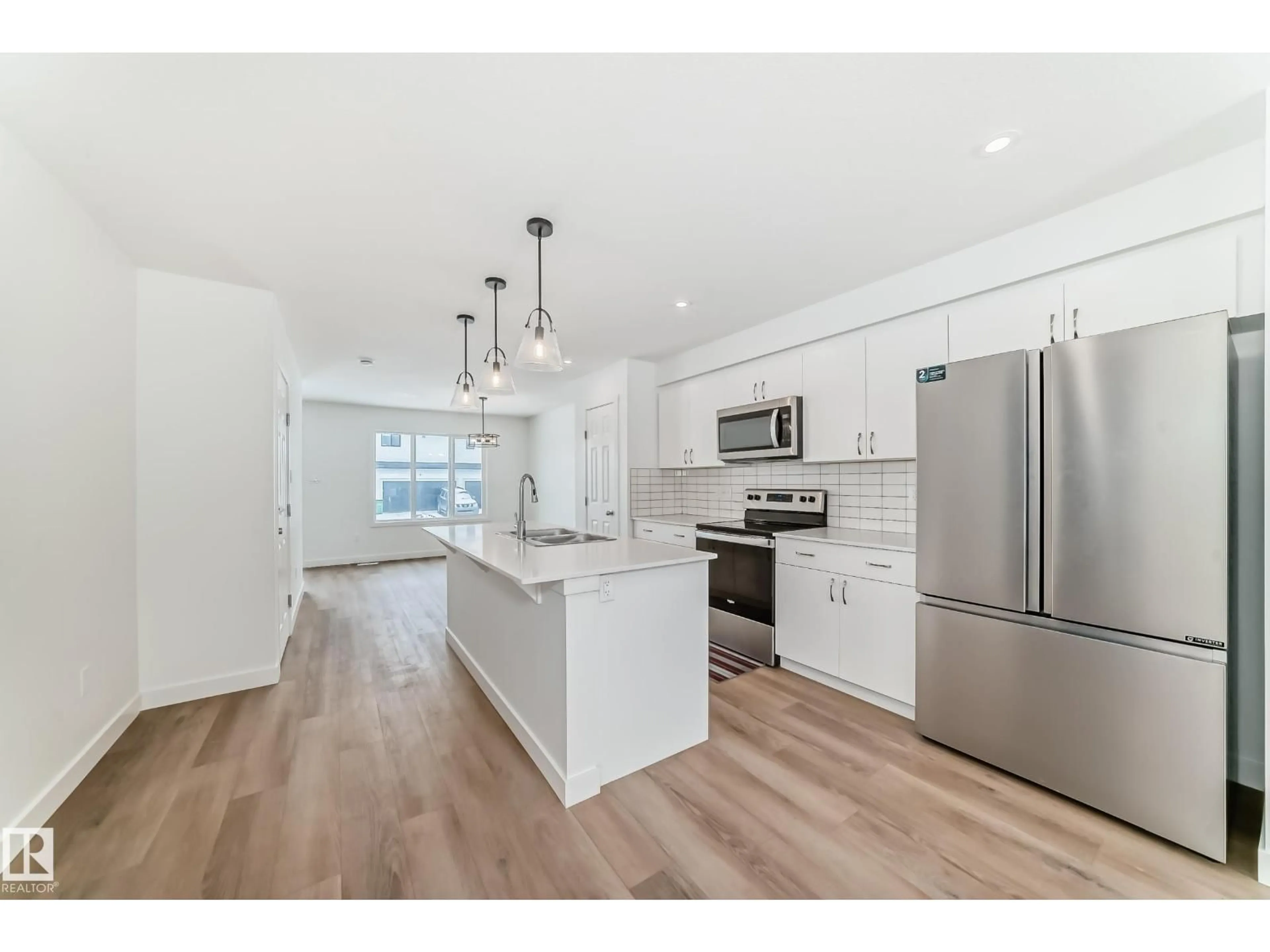 Open concept kitchen, unknown for 4611 177AVE NW, Edmonton Alberta T5Y4B7