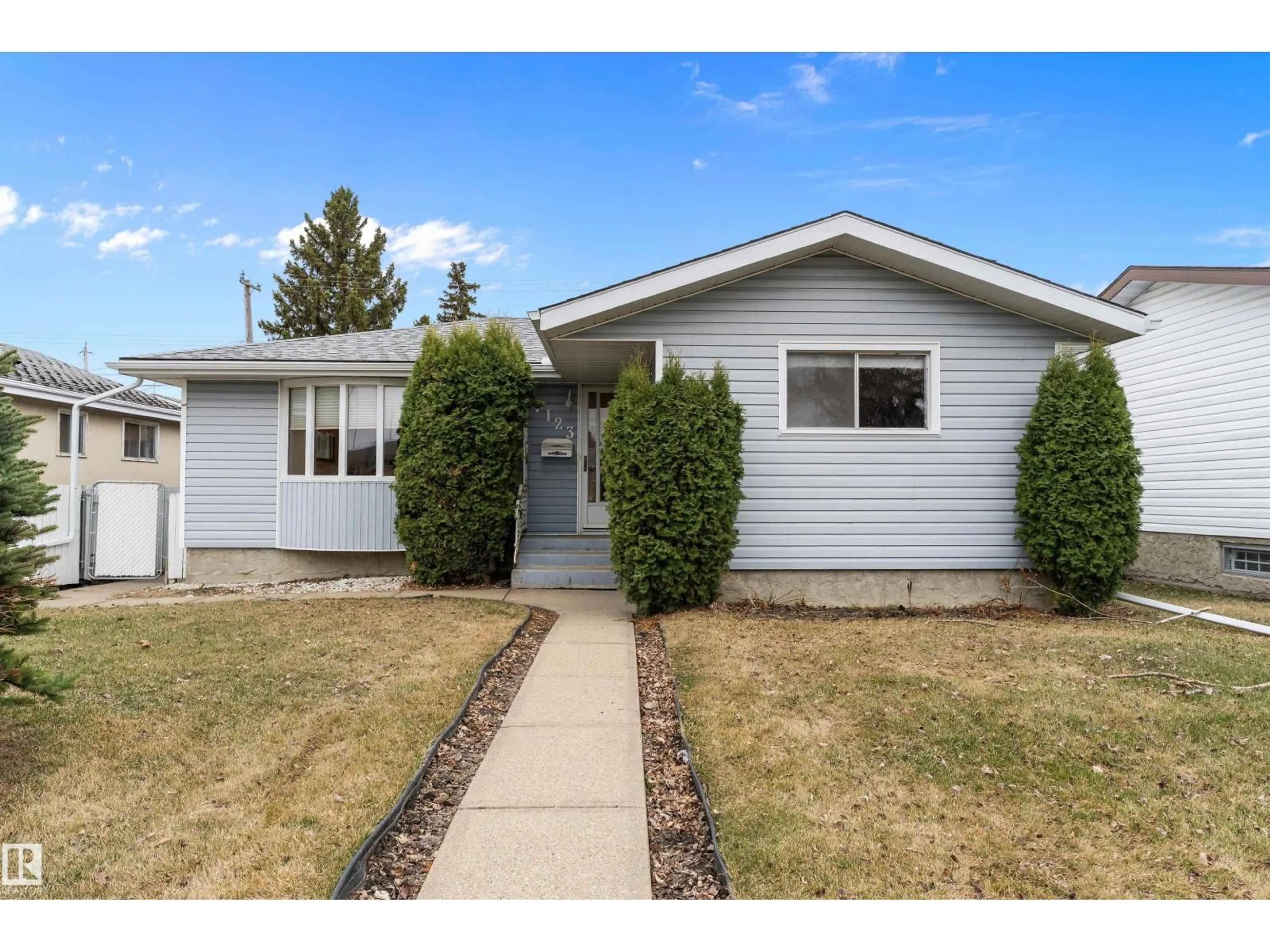 Home with vinyl exterior material, street for 7123 DELWOOD RD, Edmonton Alberta T5C3A8