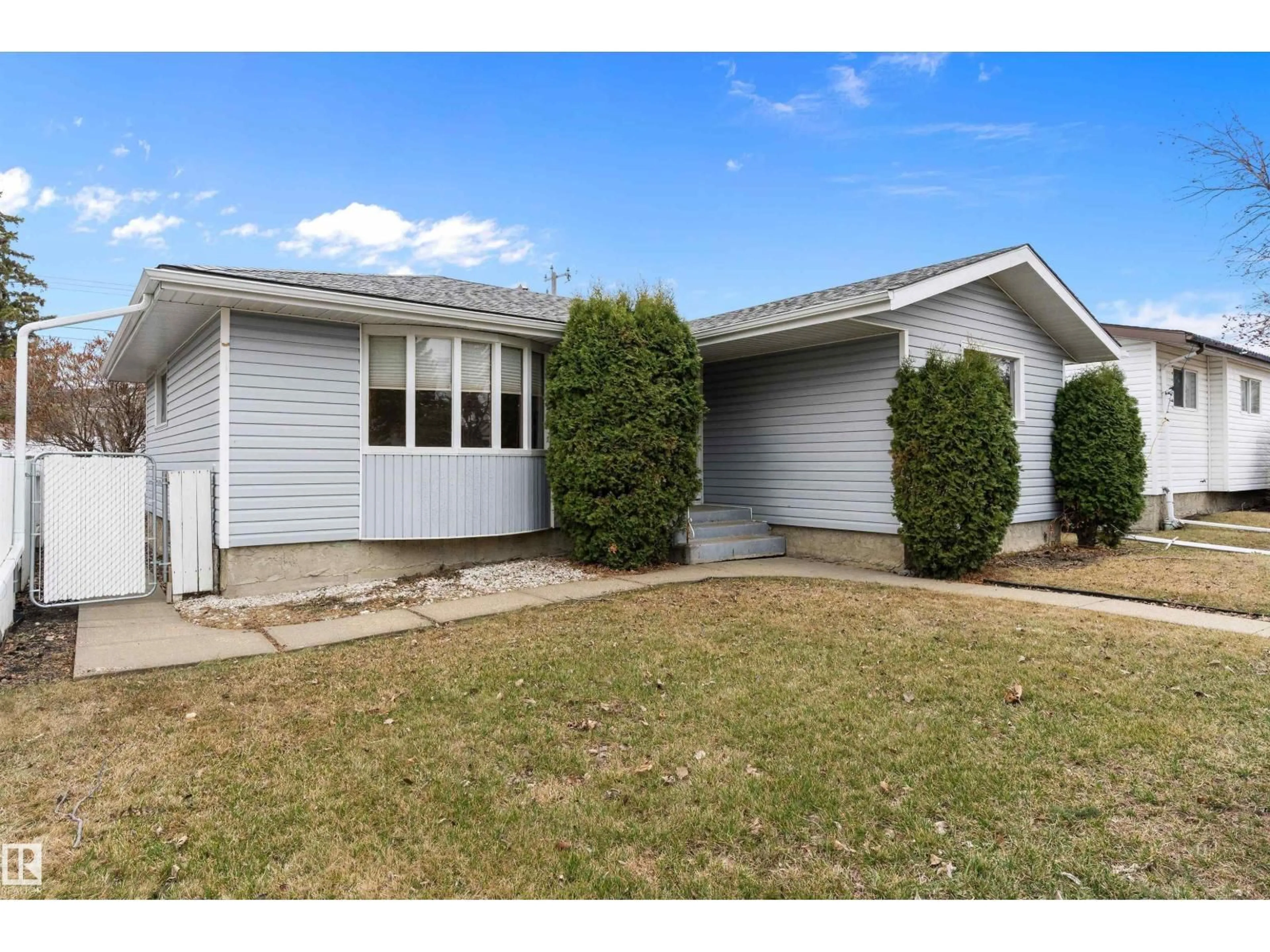 Home with vinyl exterior material, street for 7123 DELWOOD RD, Edmonton Alberta T5C3A8