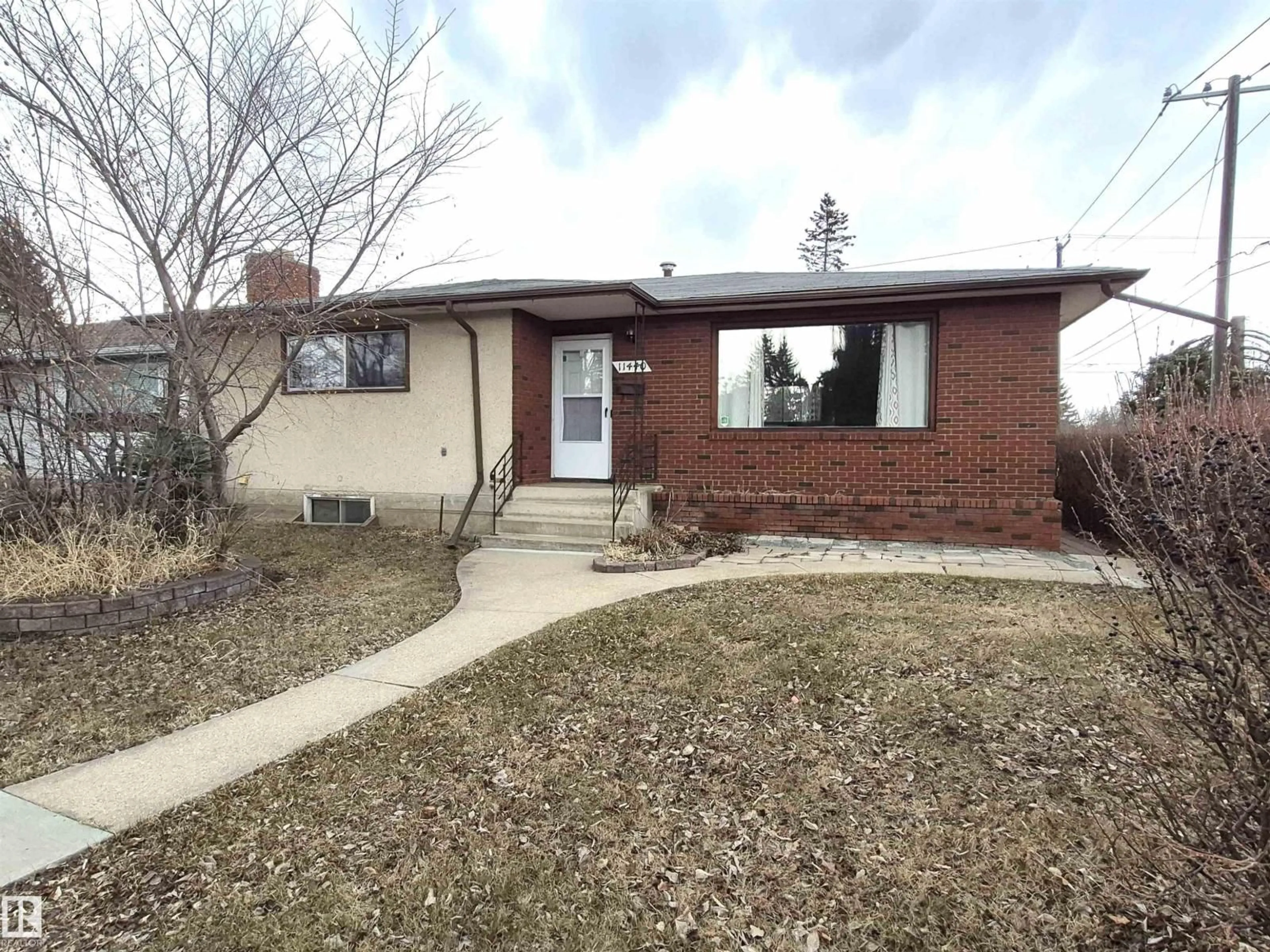 Home with brick exterior material, street for 11440 44A AV, Edmonton Alberta T6J0Z9