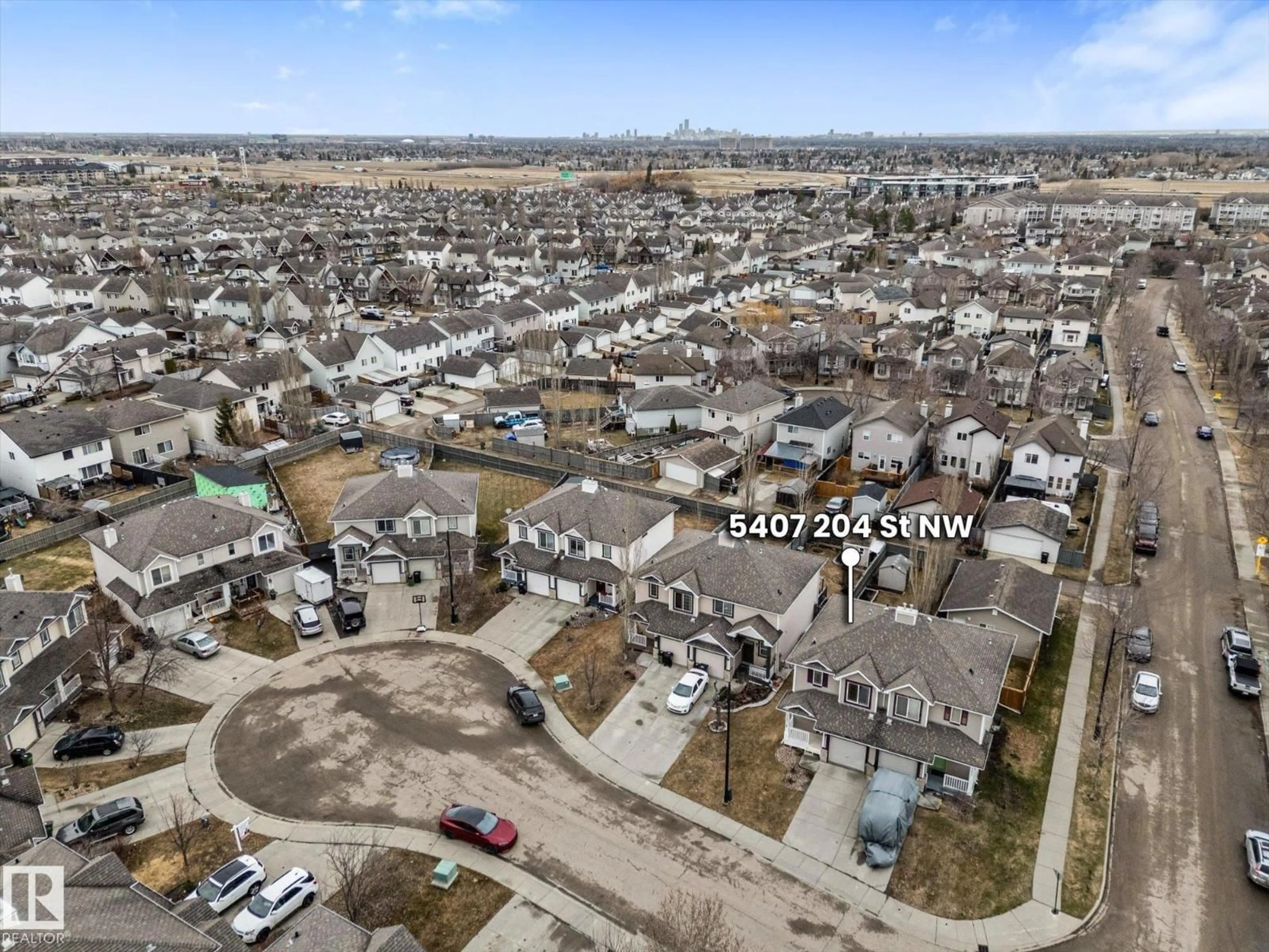 A pic from outside/outdoor area/front of a property/back of a property/a pic from drone, street for NW - 5407 204 ST, Edmonton Alberta T6M2Z1