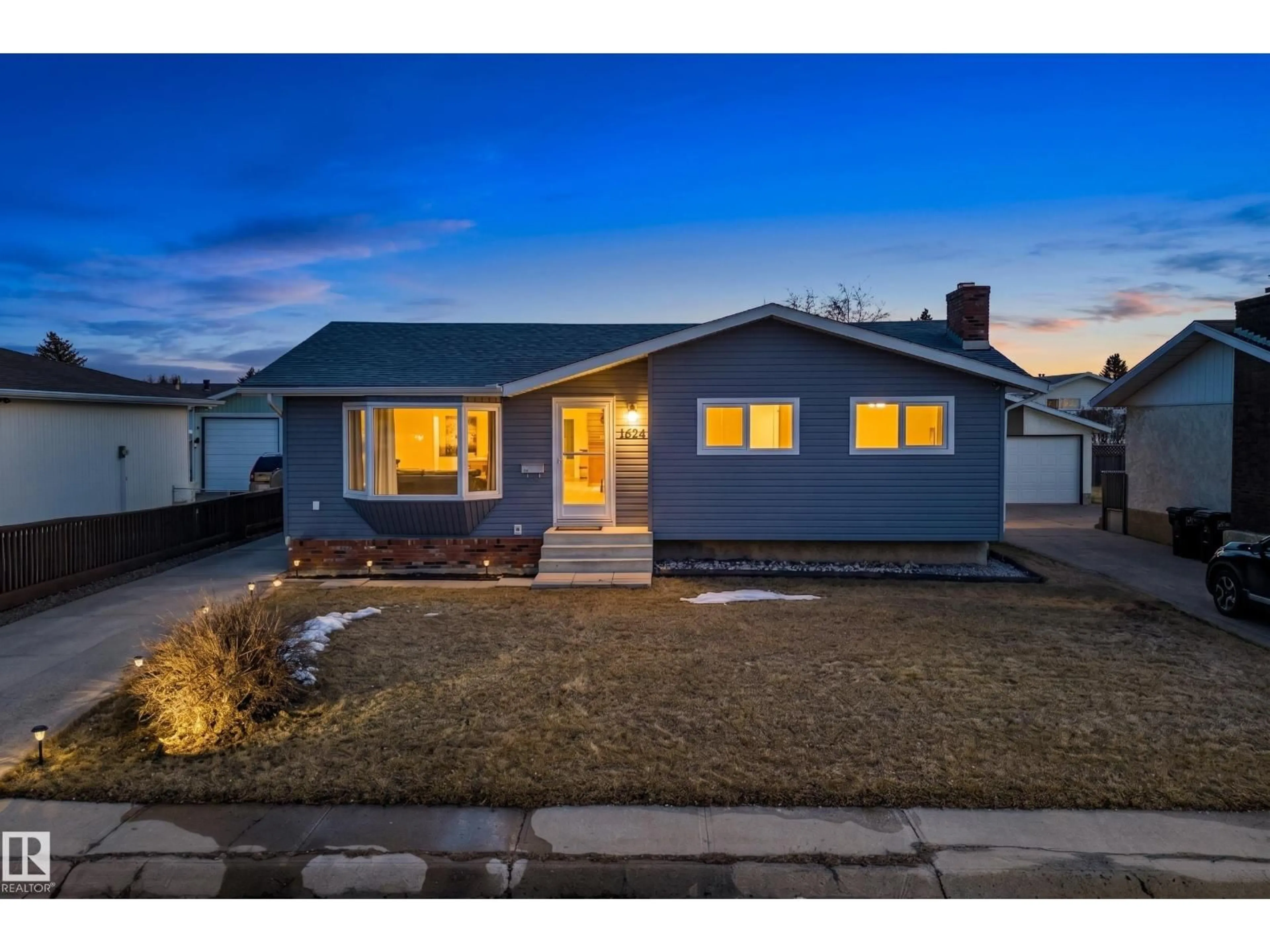 Home with vinyl exterior material, street for 11427 161 AV, Edmonton Alberta T5X2K9