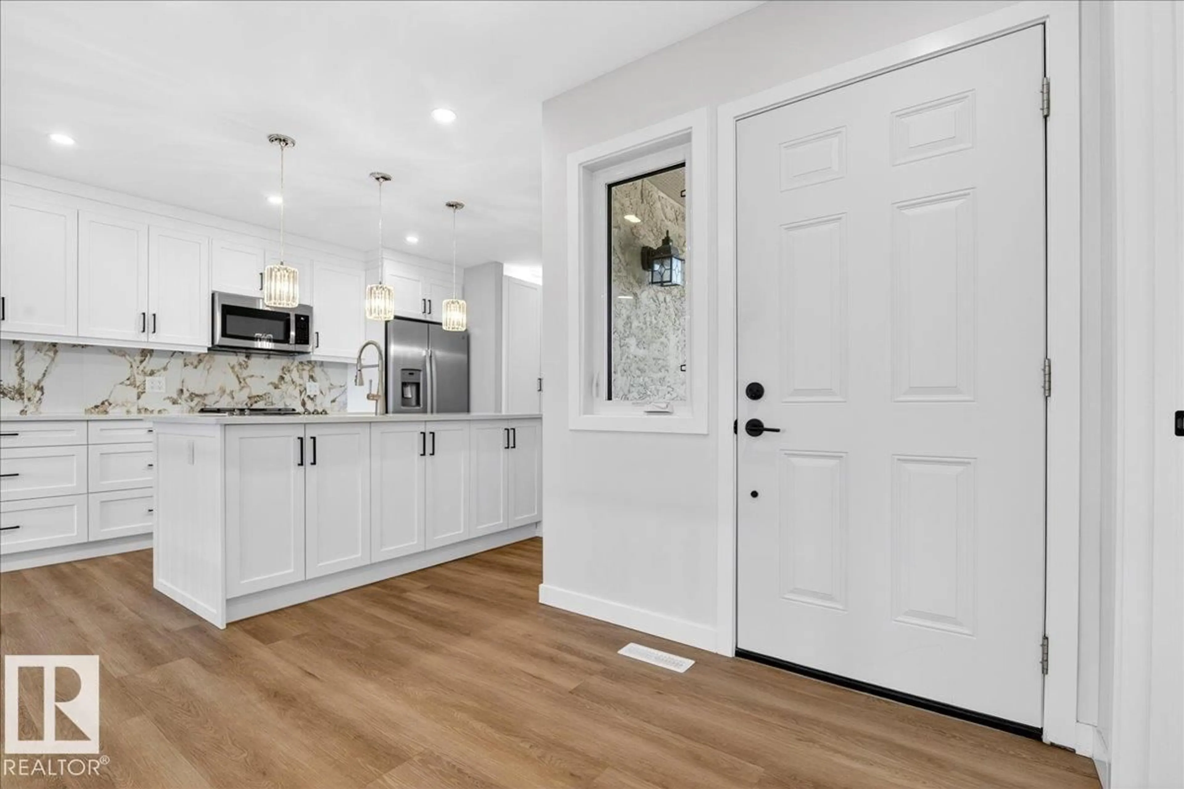 Open concept kitchen, unknown for 257 KNOTTWOOD RD N, Edmonton Alberta T6X4B9