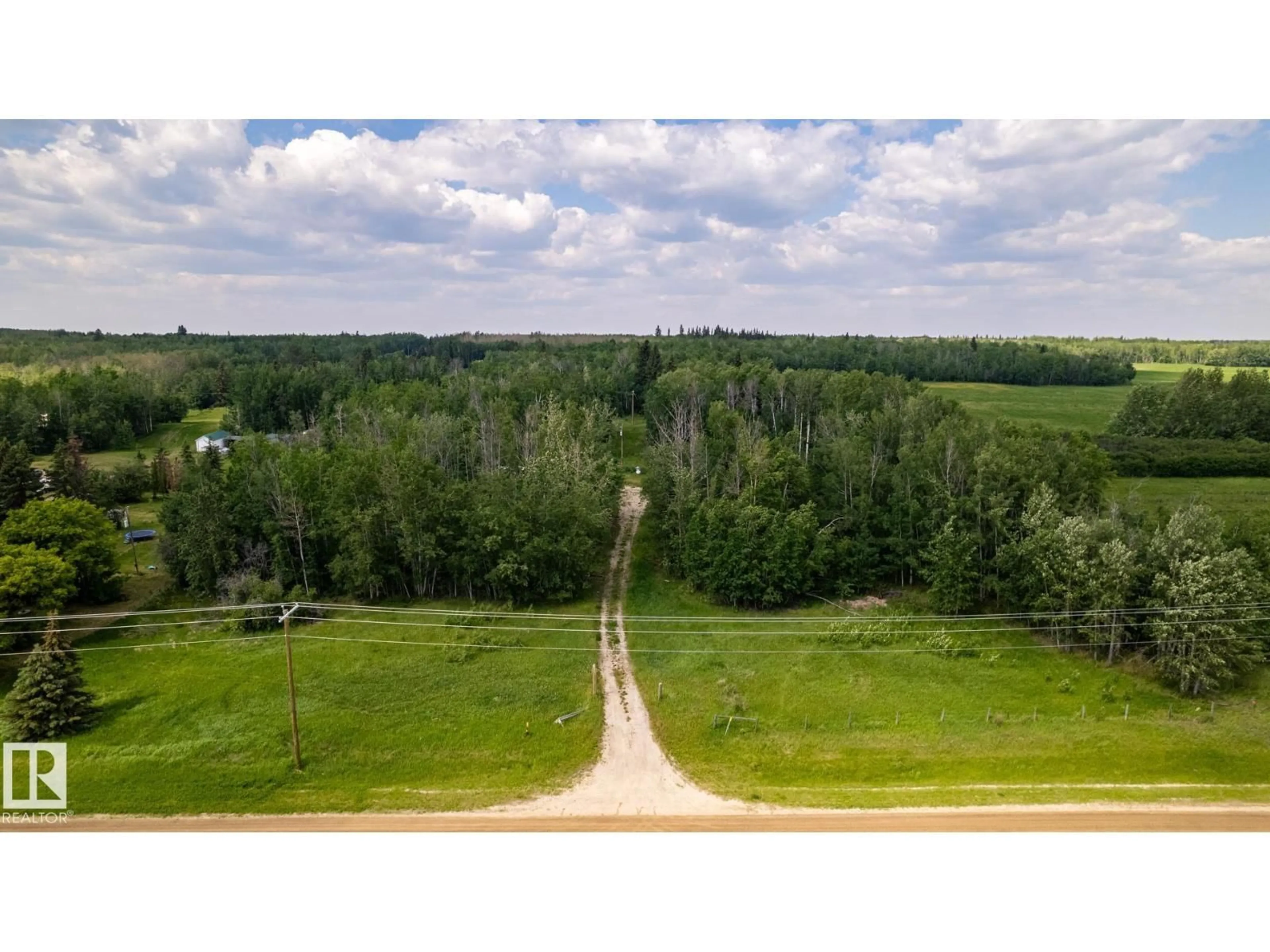 A pic from outside/outdoor area/front of a property/back of a property/a pic from drone, forest/trees view for 5430 HGHWAY 16, Rural Parkland County Alberta T0E0W0