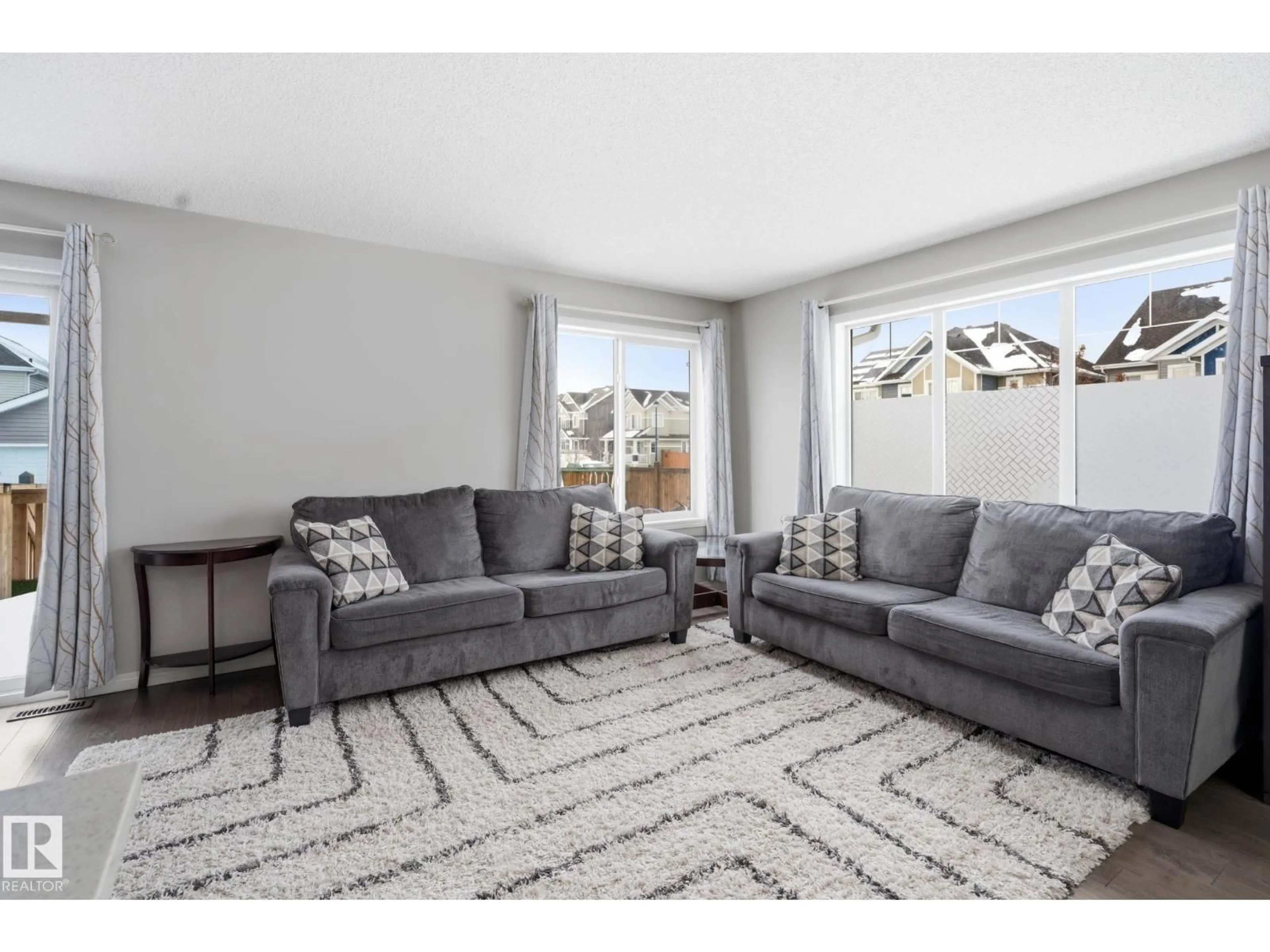 Living room with furniture, carpet floor for SW - 2310 68 STREET, Edmonton Alberta T6X2B1
