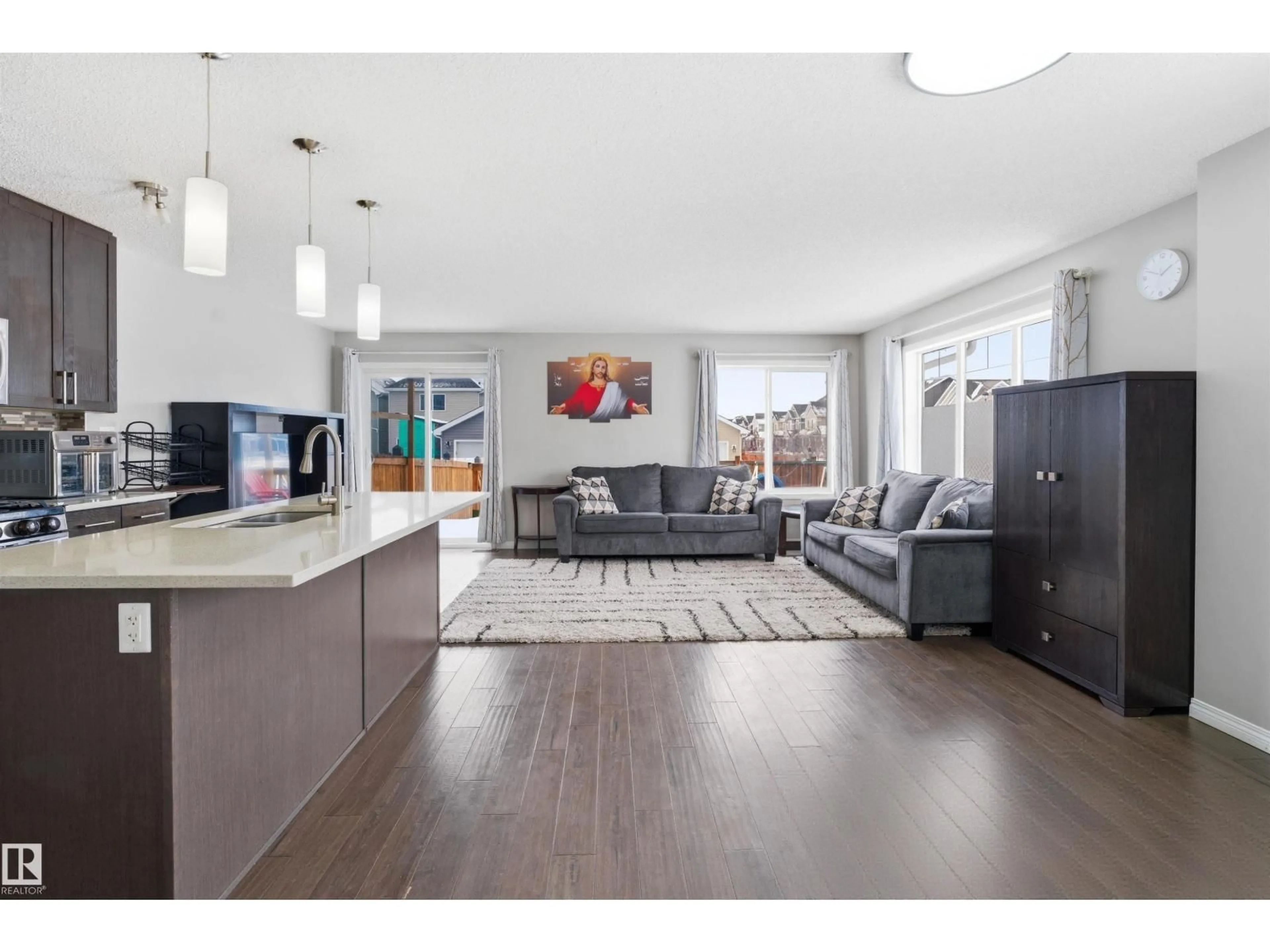 Open concept kitchen, wood/laminate floor for SW - 2310 68 STREET, Edmonton Alberta T6X2B1