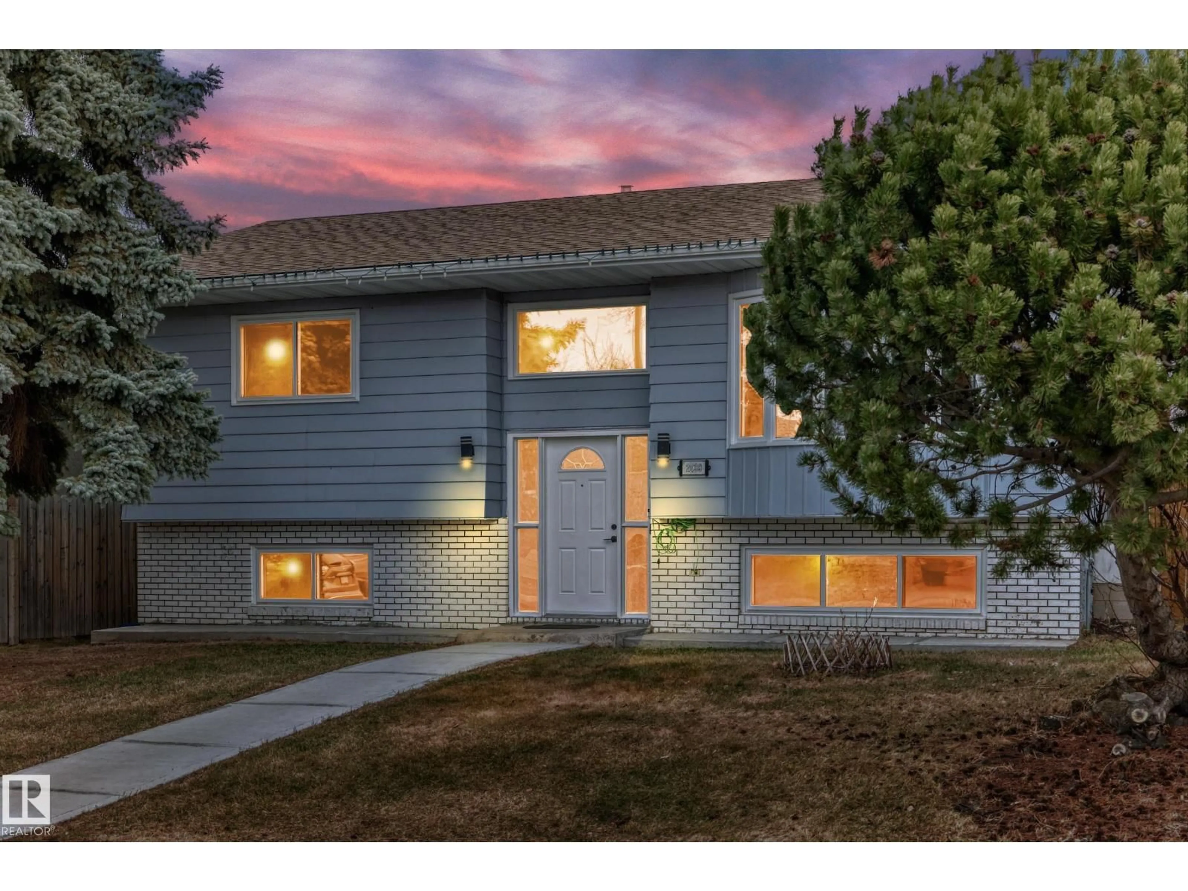 Home with vinyl exterior material, street for 2039 48 ST, Edmonton Alberta T6L2W5